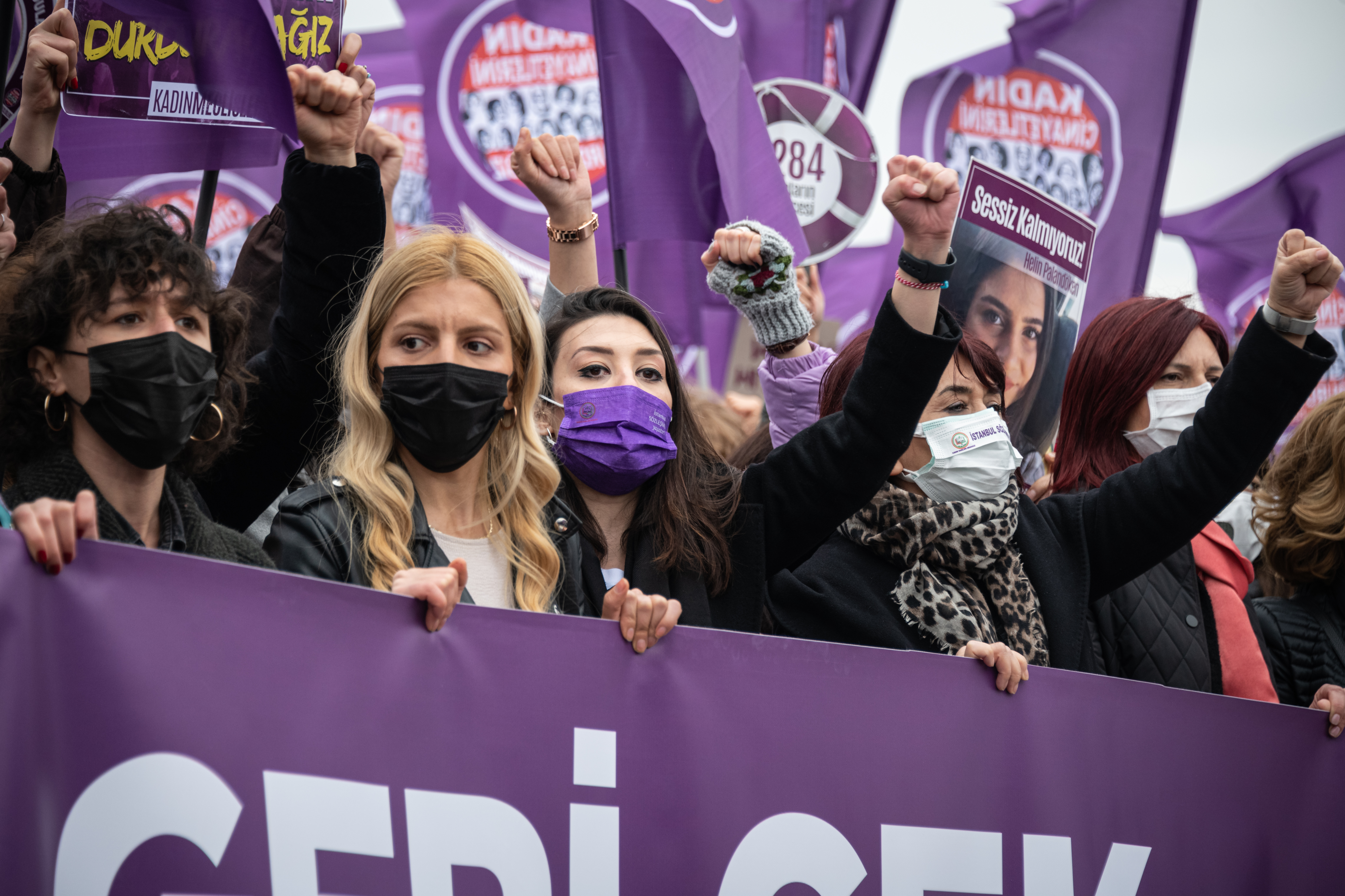 Protesters chanted feminist slogans and held up signs denouncing the government decision photo.