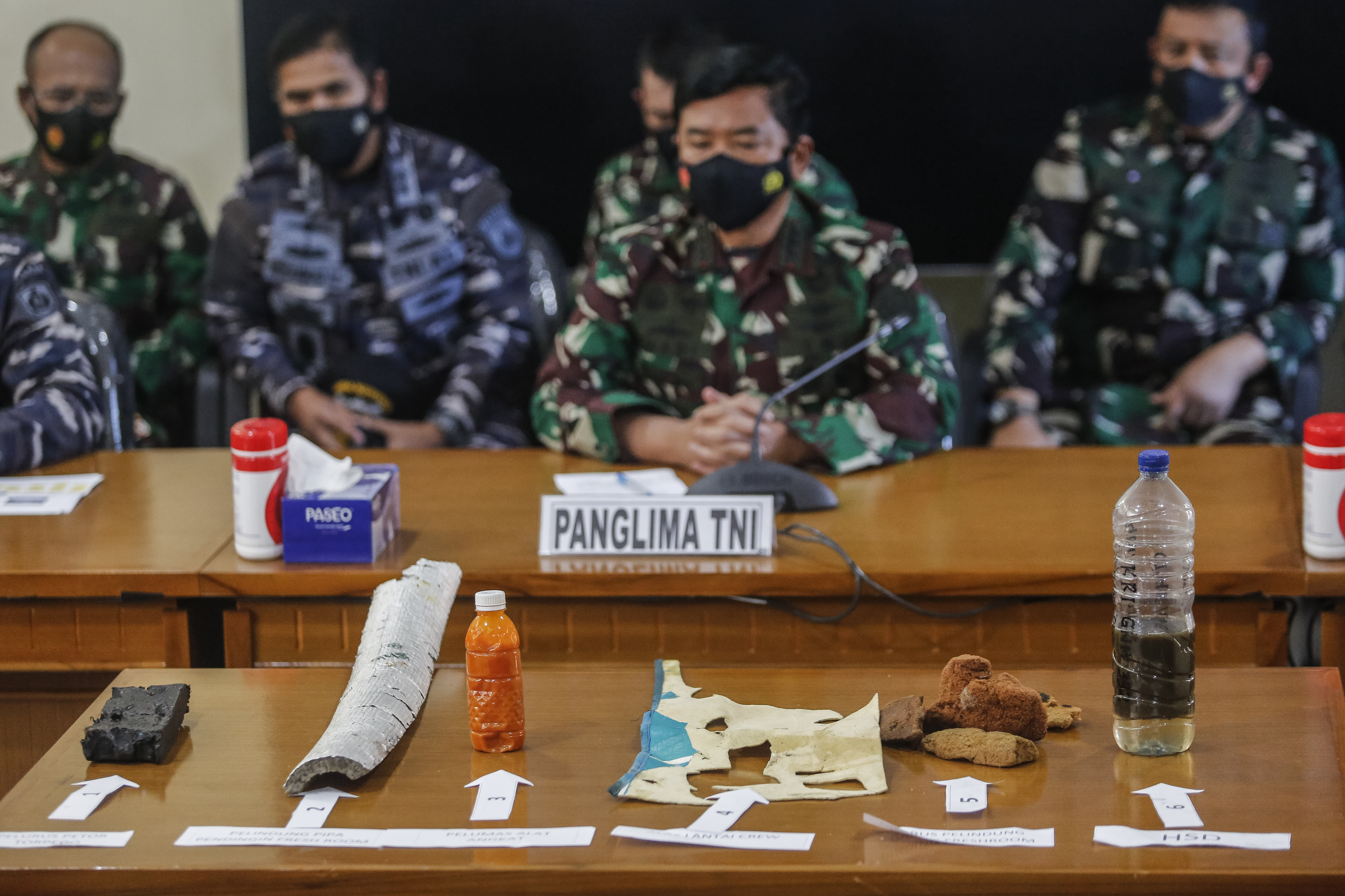 Debris from missing Indonesian navy submarine KRI Nanggala 402 displayed during press conference at Ngurah Rai Military Air Base in Kuta, Bali, Indonesia.