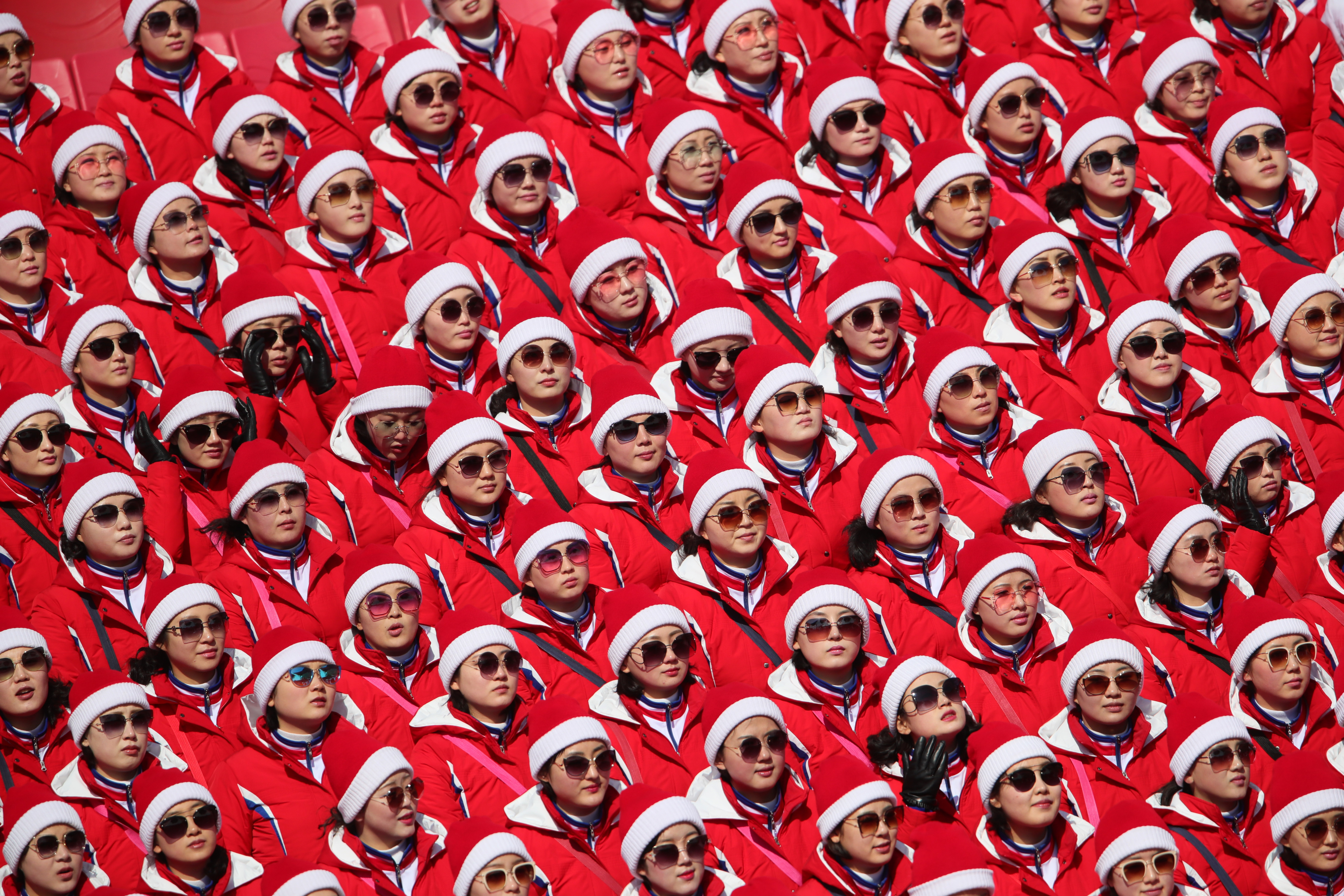 South Korea, Pyeongchang, Olympics, Alpine Skiing, Men's slalom, first round, Yongpyong Alpine Centre: North Korea's cheerleaders sit in the stands photo.