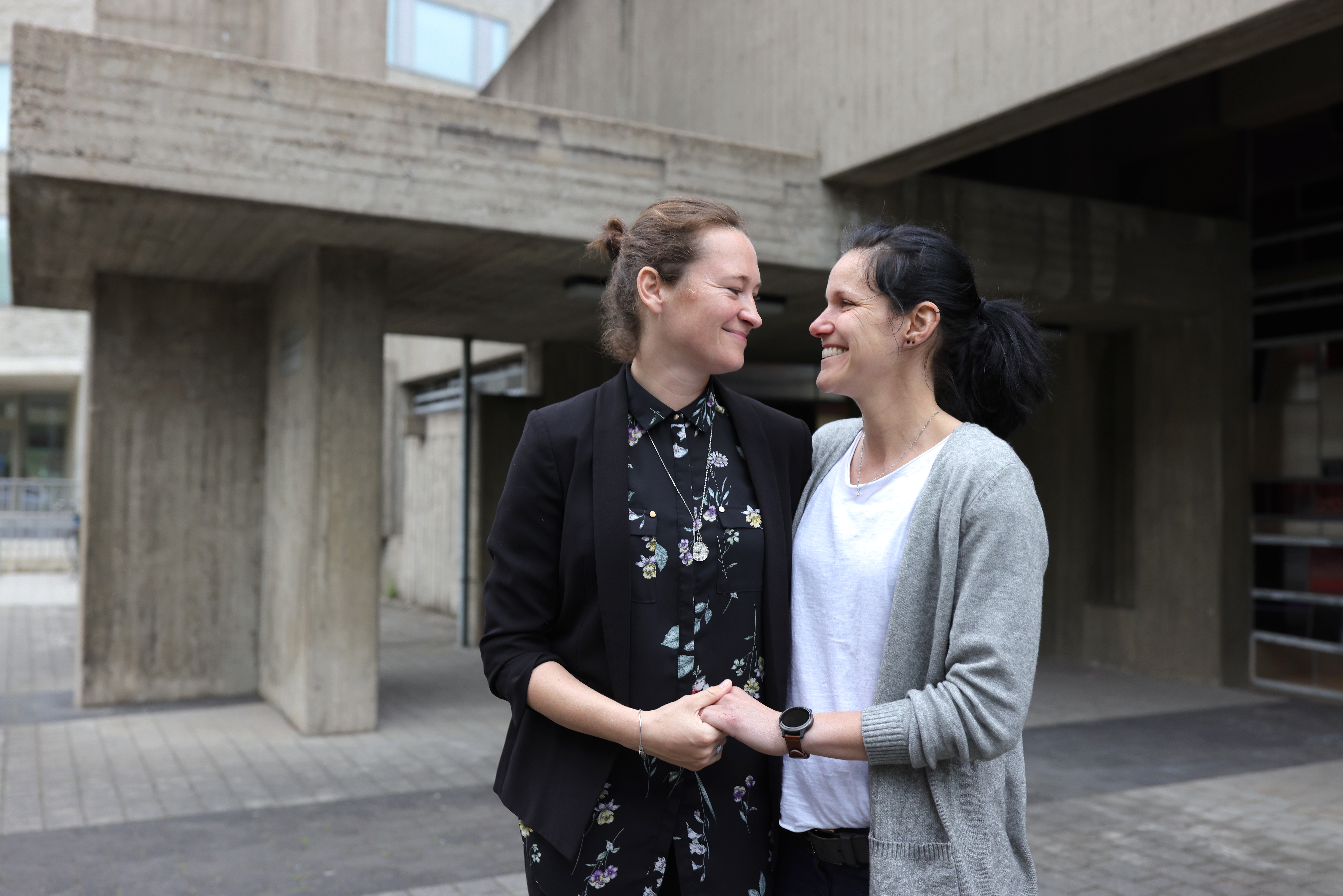 Chantal Hoeffer and Ivonne Fuchs, smile happily after Brigitte Schmidt, a pastoral worker blesses the same-sex couple at the Catholic St. Johannes XXIII church in Cologne, Germany.