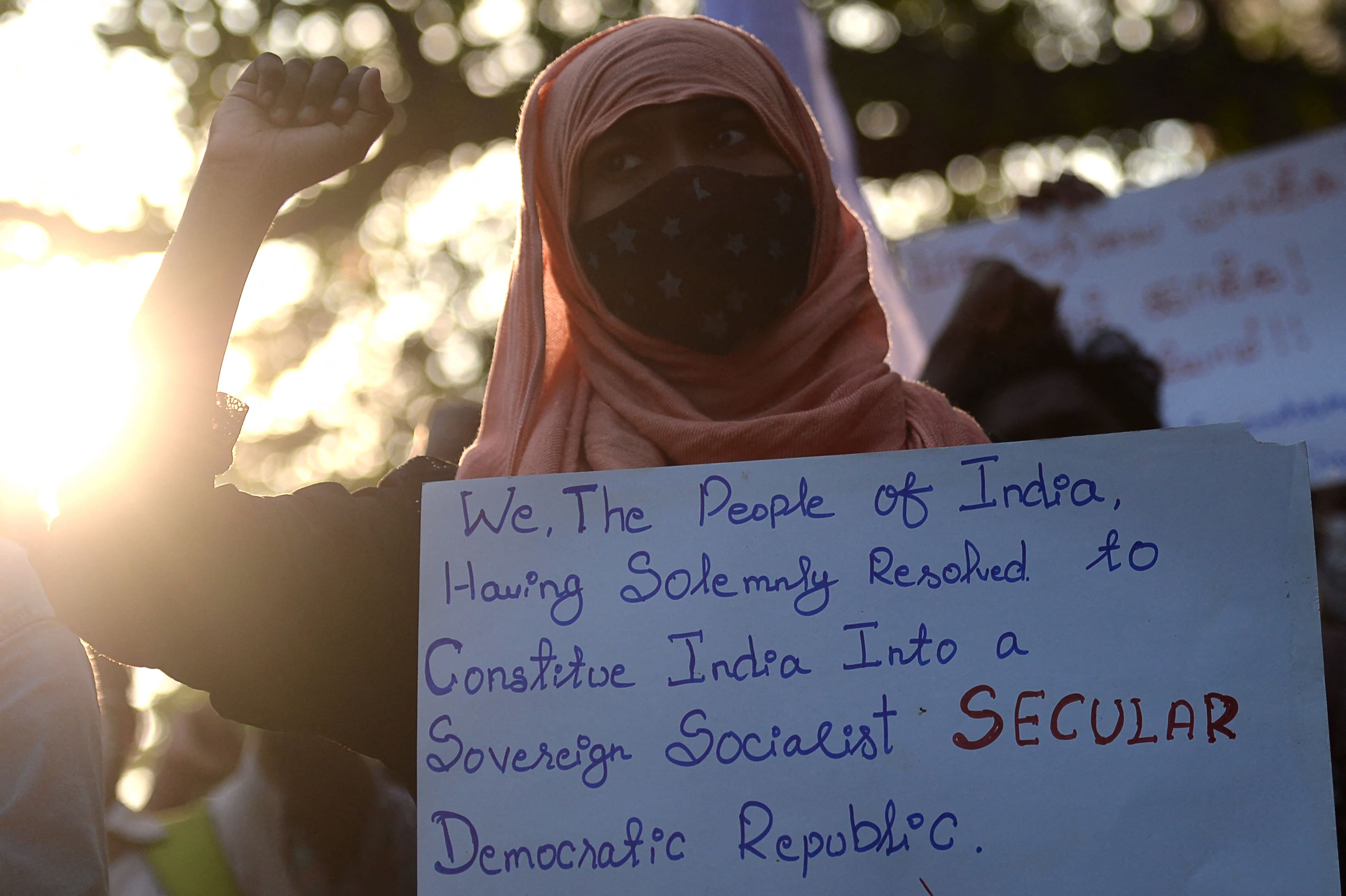 An Indian state banned Muslim girls from wearing hijabs in school and people were protesting