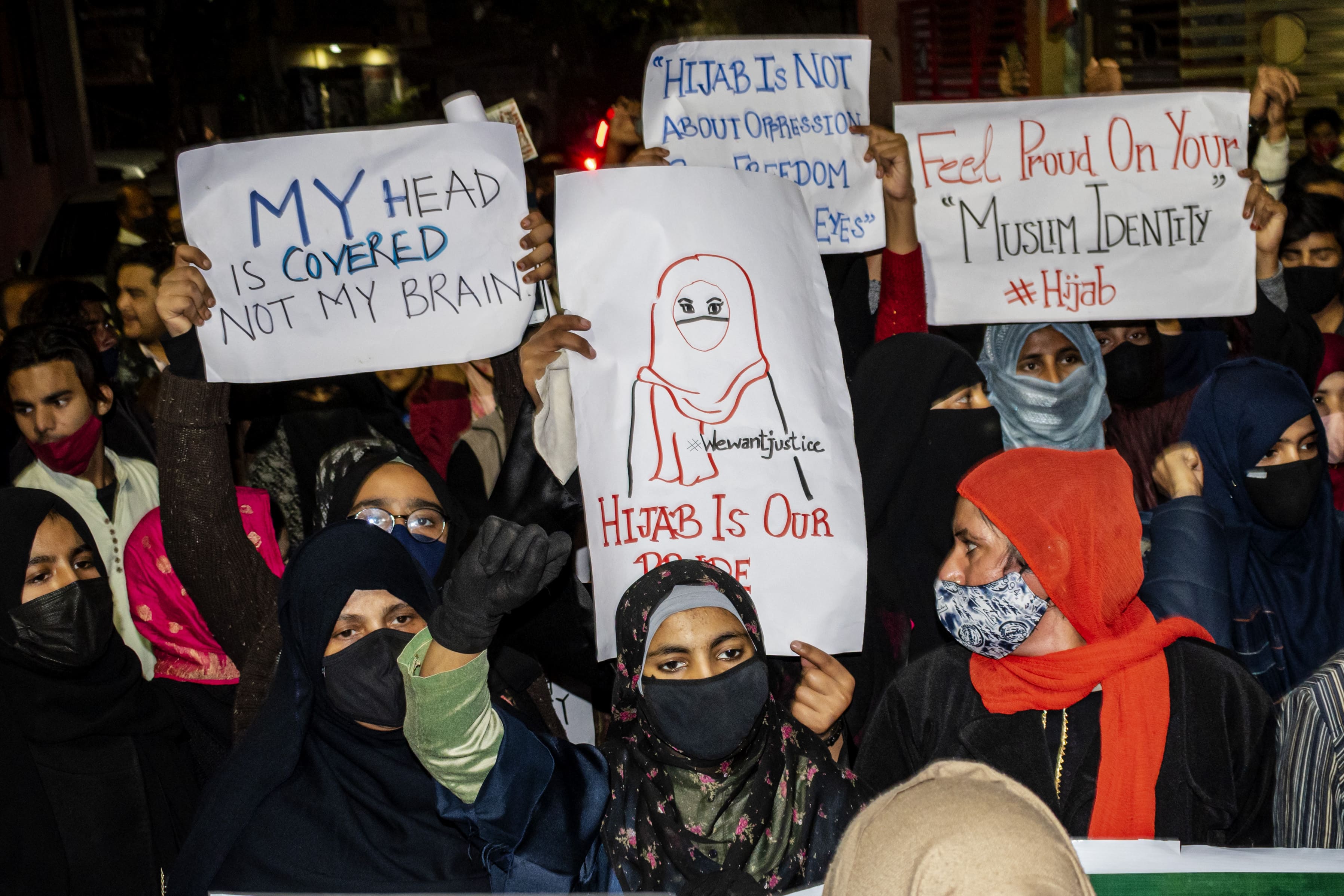 An Indian state banned Muslim girls from wearing hijabs in school and people were protesting
