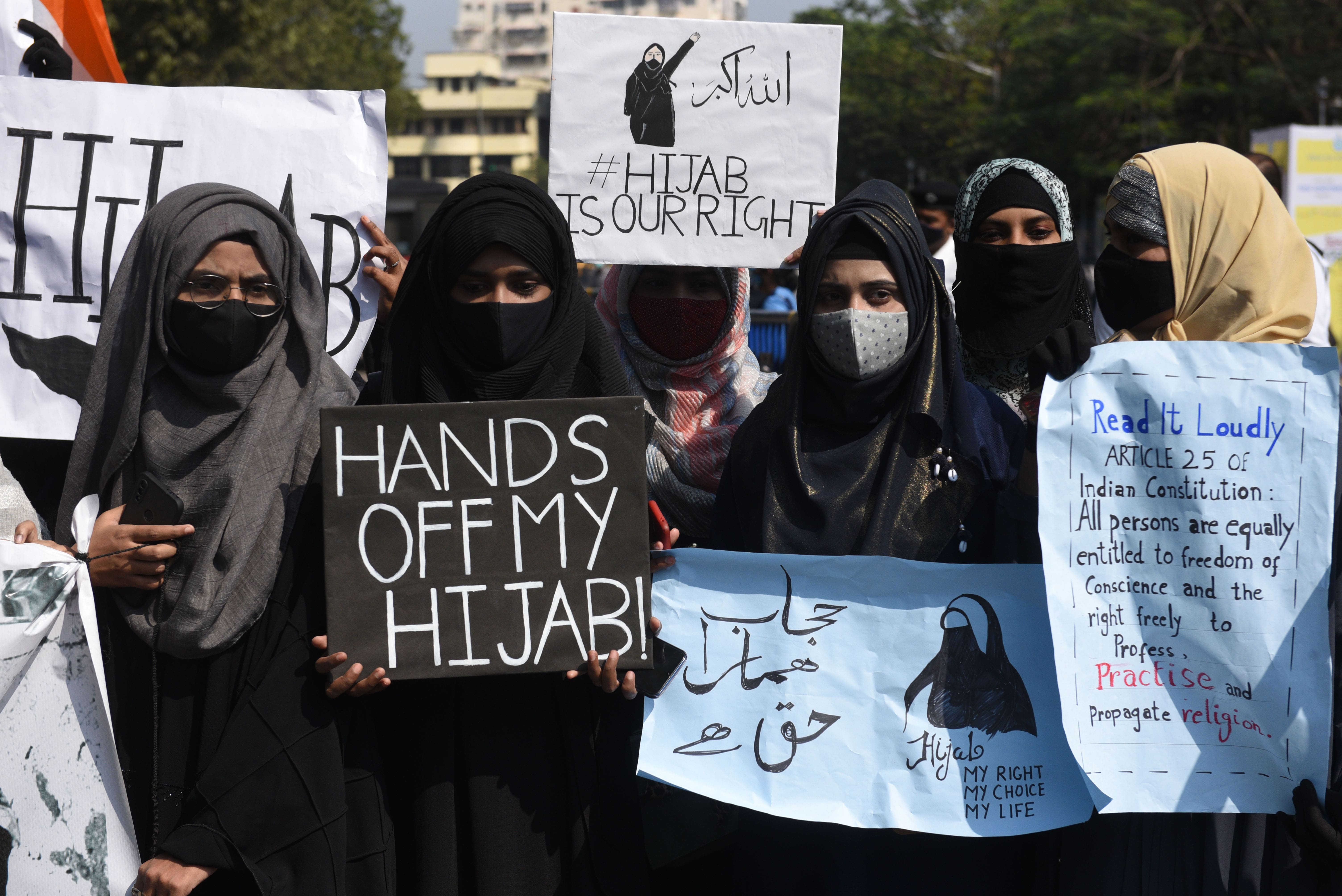An Indian state banned Muslim girls from wearing hijabs in school and people were protesting