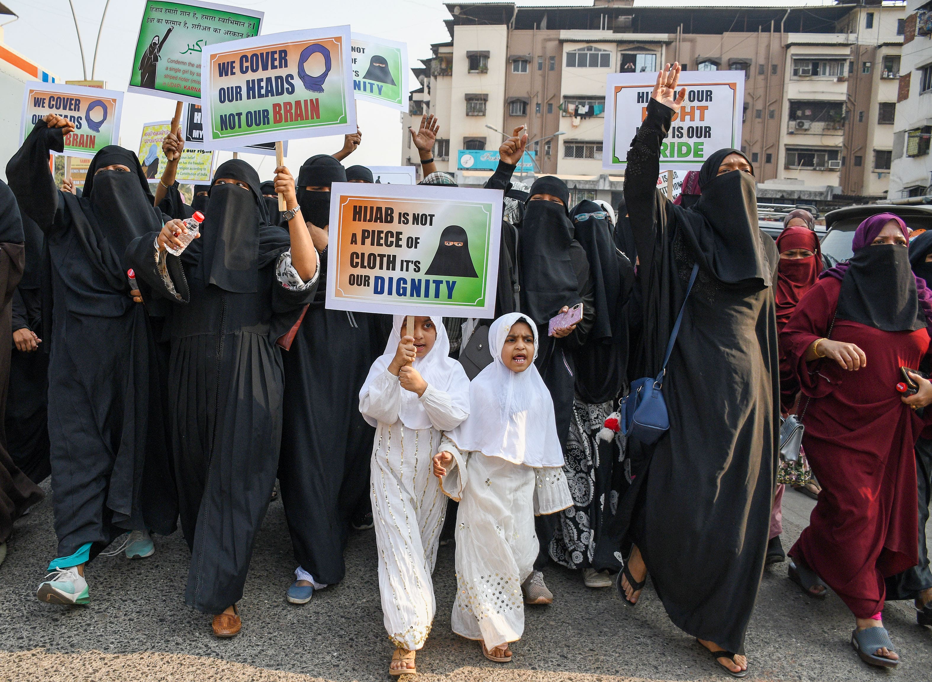 An Indian state banned Muslim girls from wearing hijabs in school and people were protesting