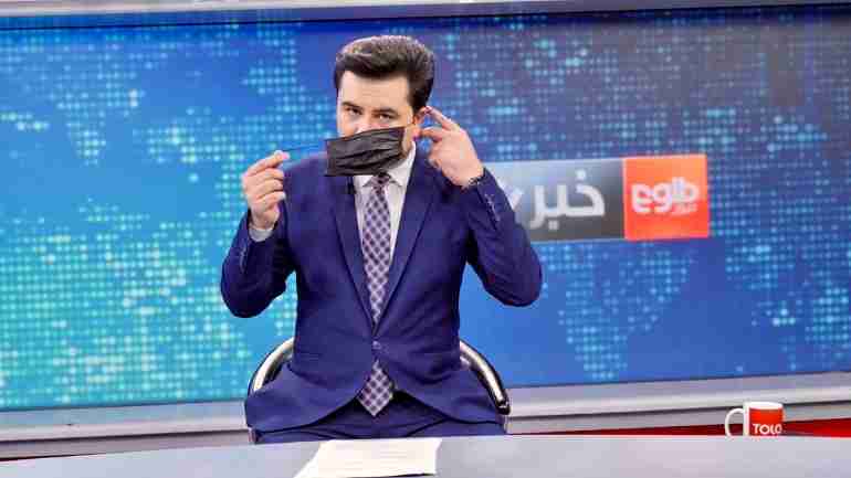 afghan male tv anchors cover faces support women