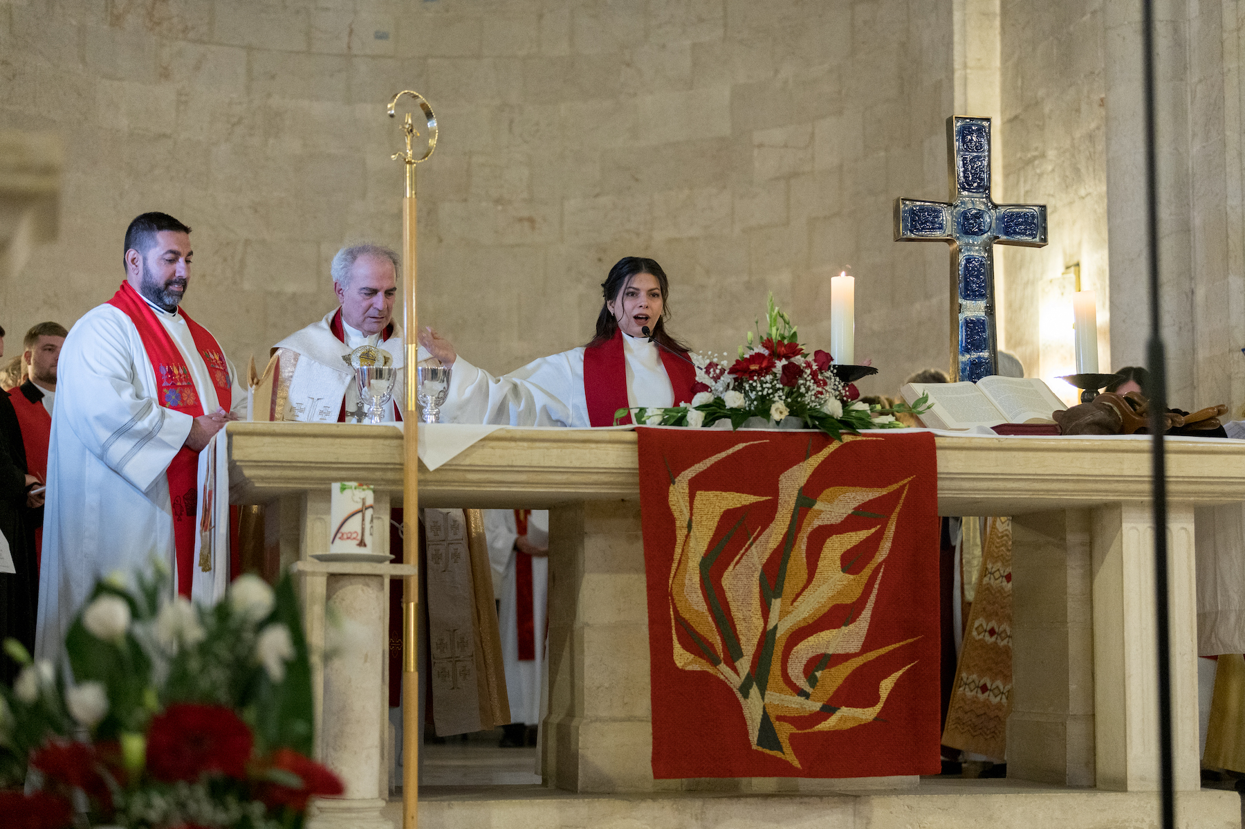 pastor sally azar sharing messages on the stage after being ordained