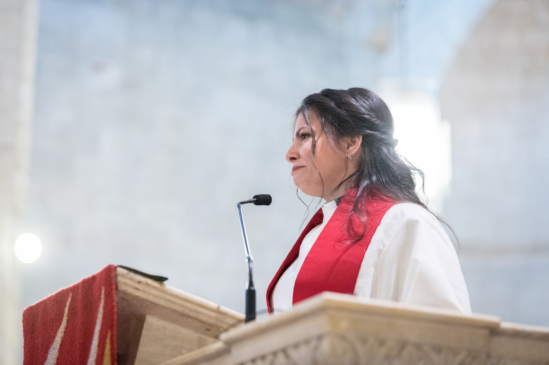 pastor sally azar sharing messages on the stage after being ordained