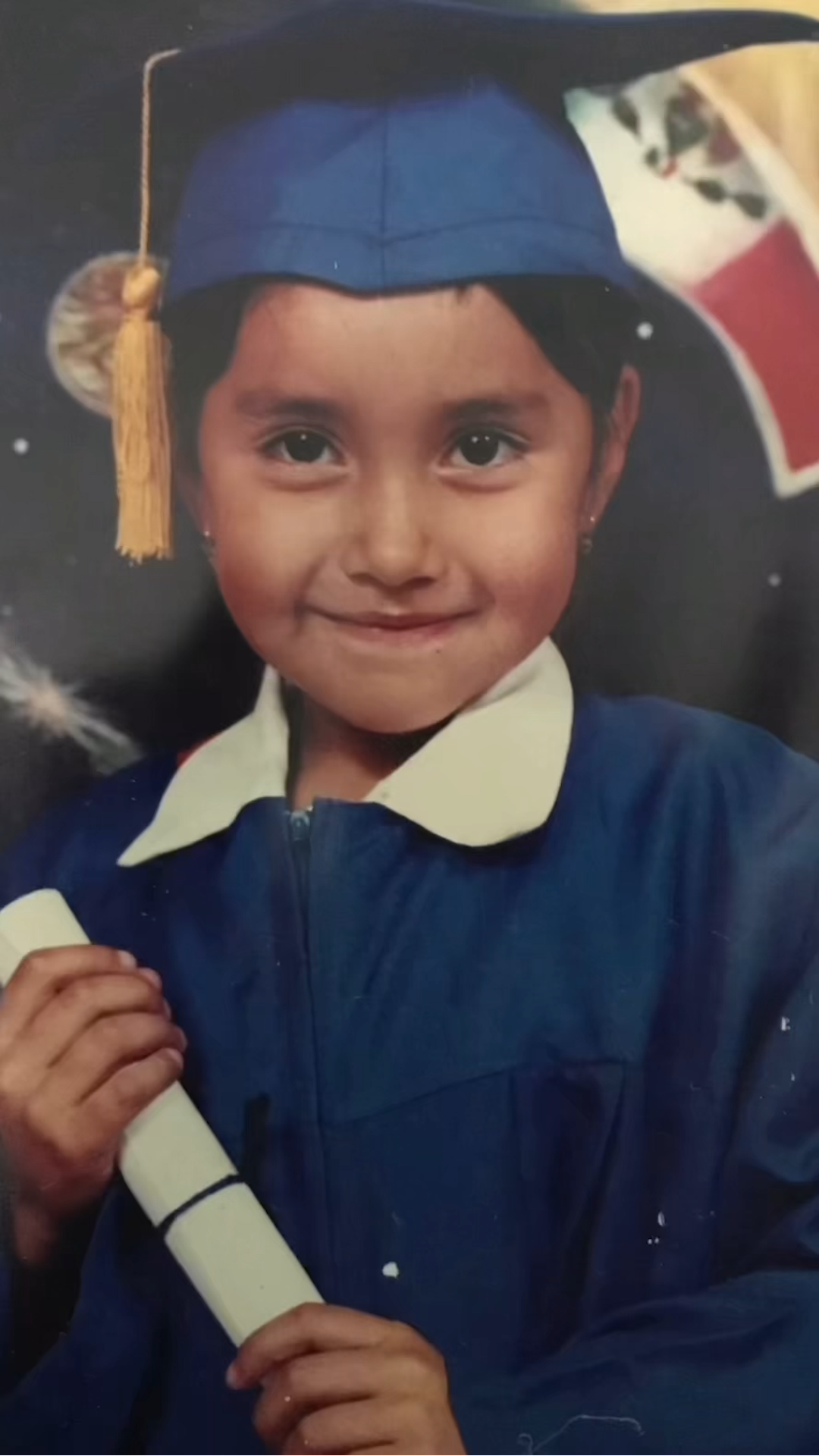 Katya Echazarreta first mexican woman into space graduating from elementary school and holding her certificate looking confident