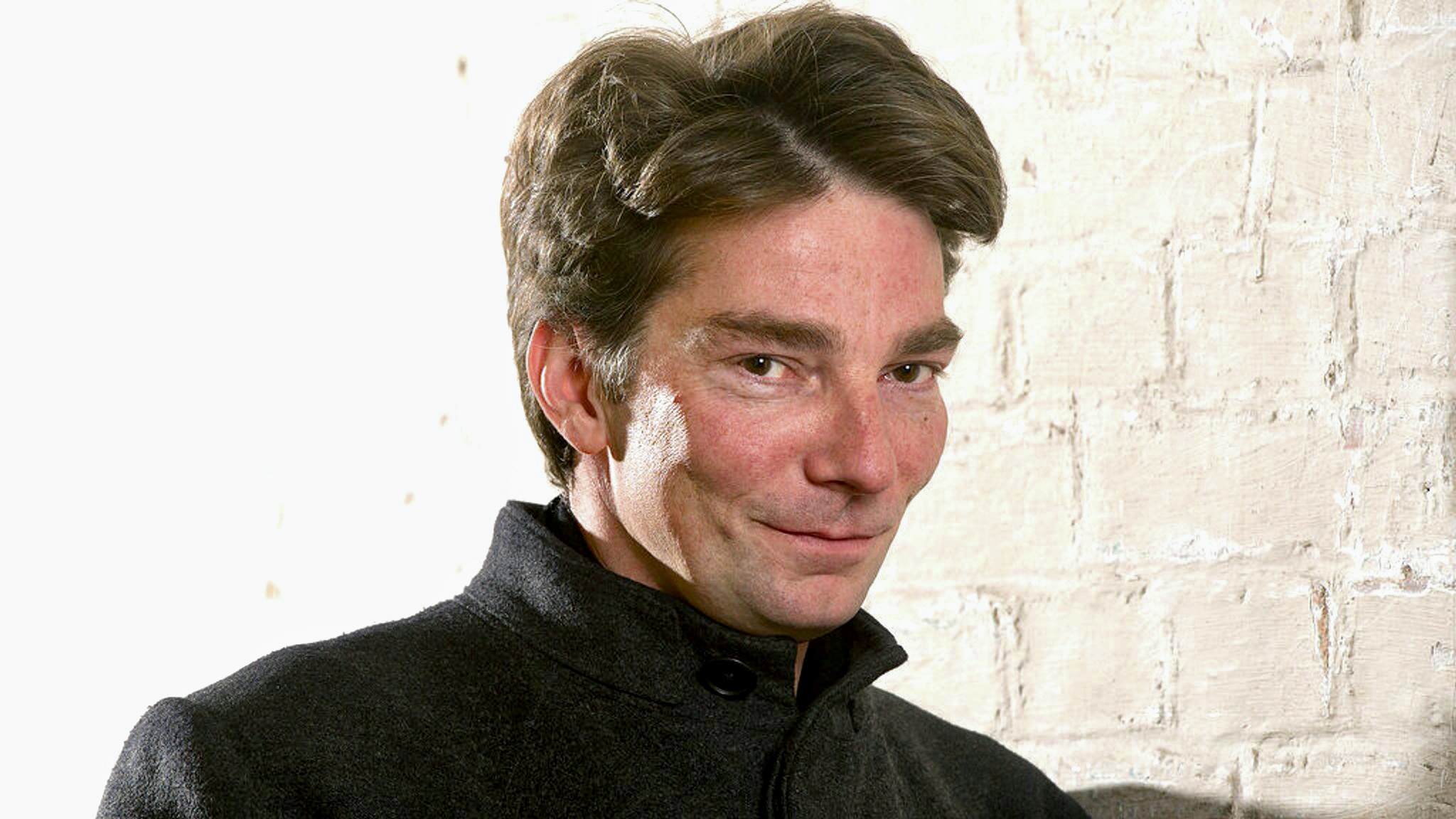 marco goecke german ballet director smiling at the camera