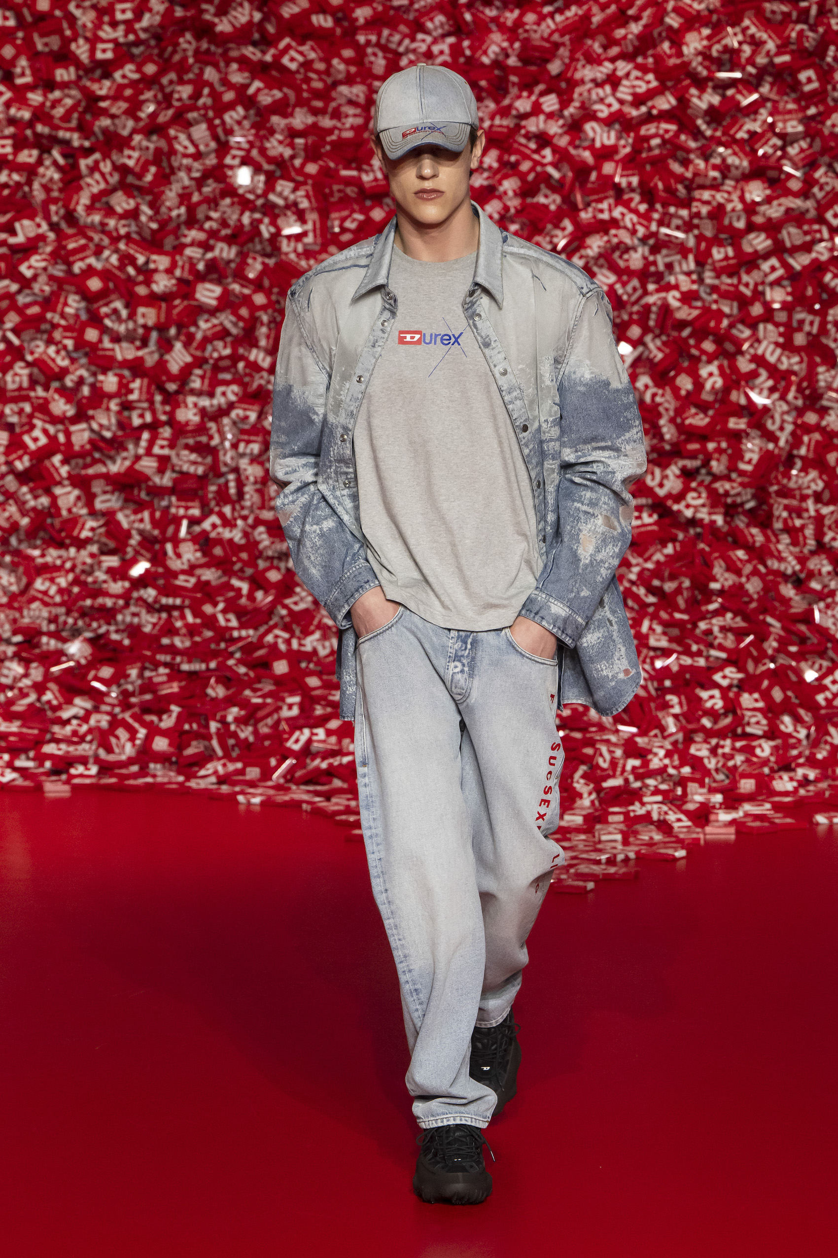 A model walks the runway at the Diesel fashion show during the Milan Fashion Week