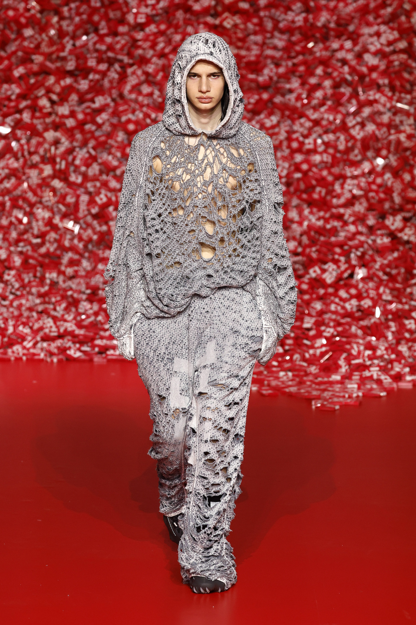 A model walks the runway at the Diesel fashion show during the Milan Fashion Week