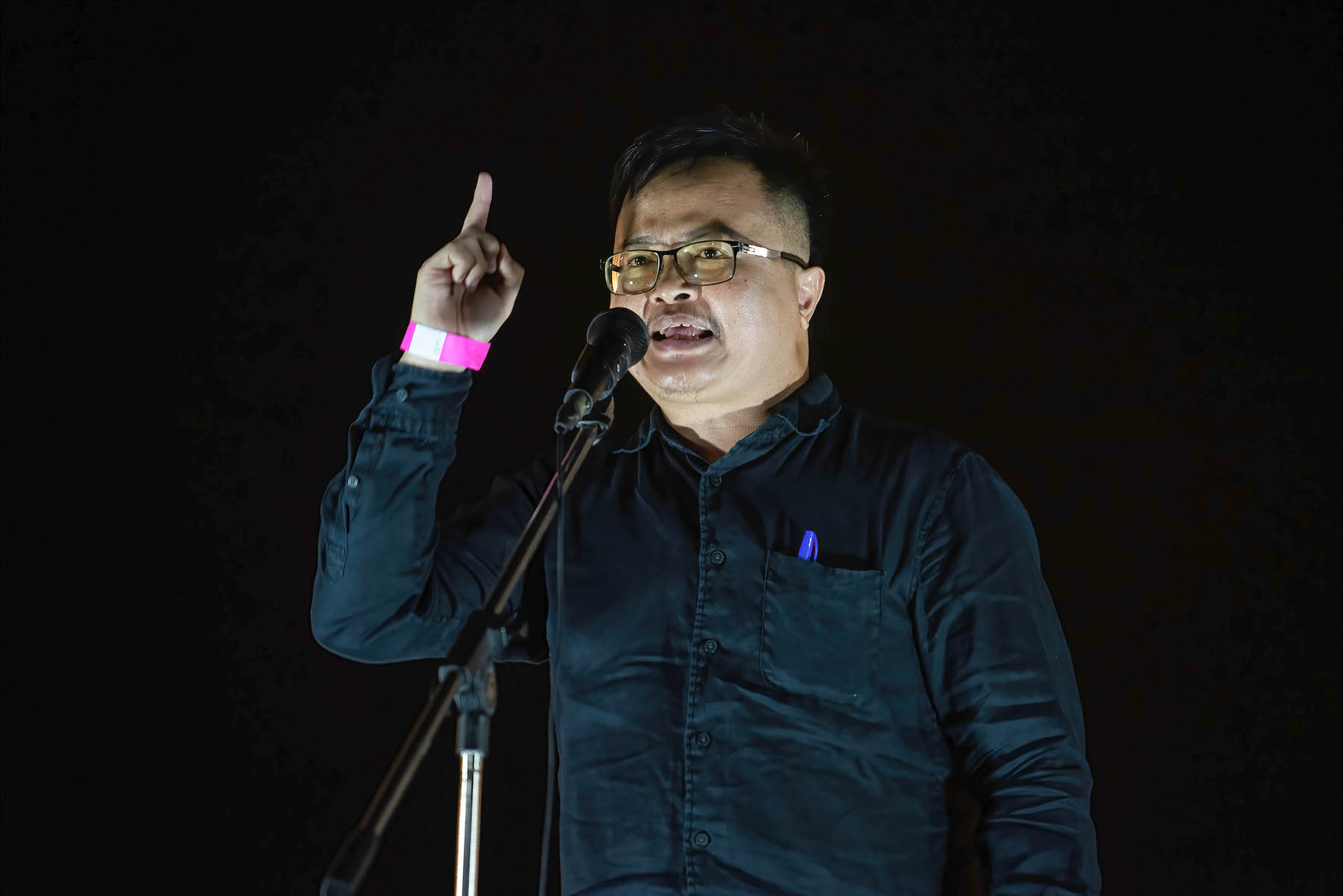 Thailand activist Arnon Nampa speaks to anti government protesters