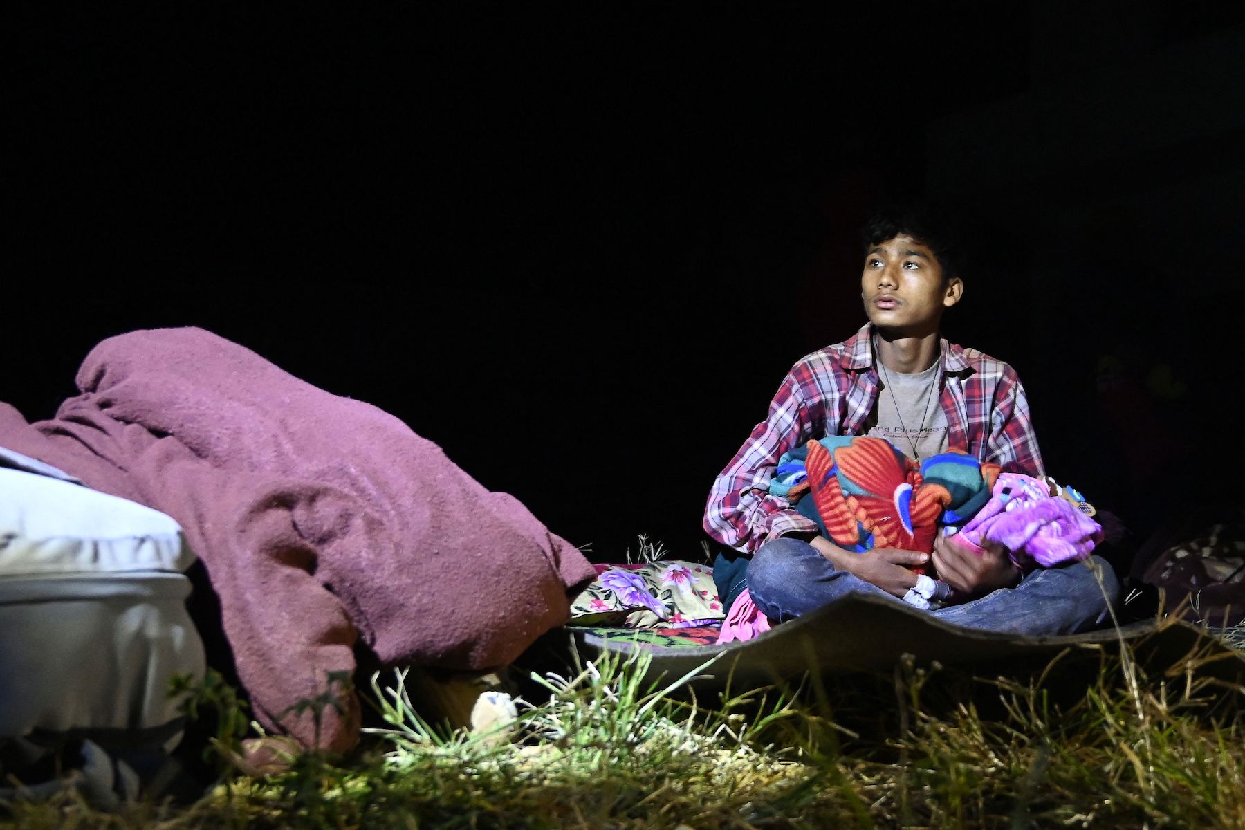 nepal earthquake jajarkot 2023 resident holding baby