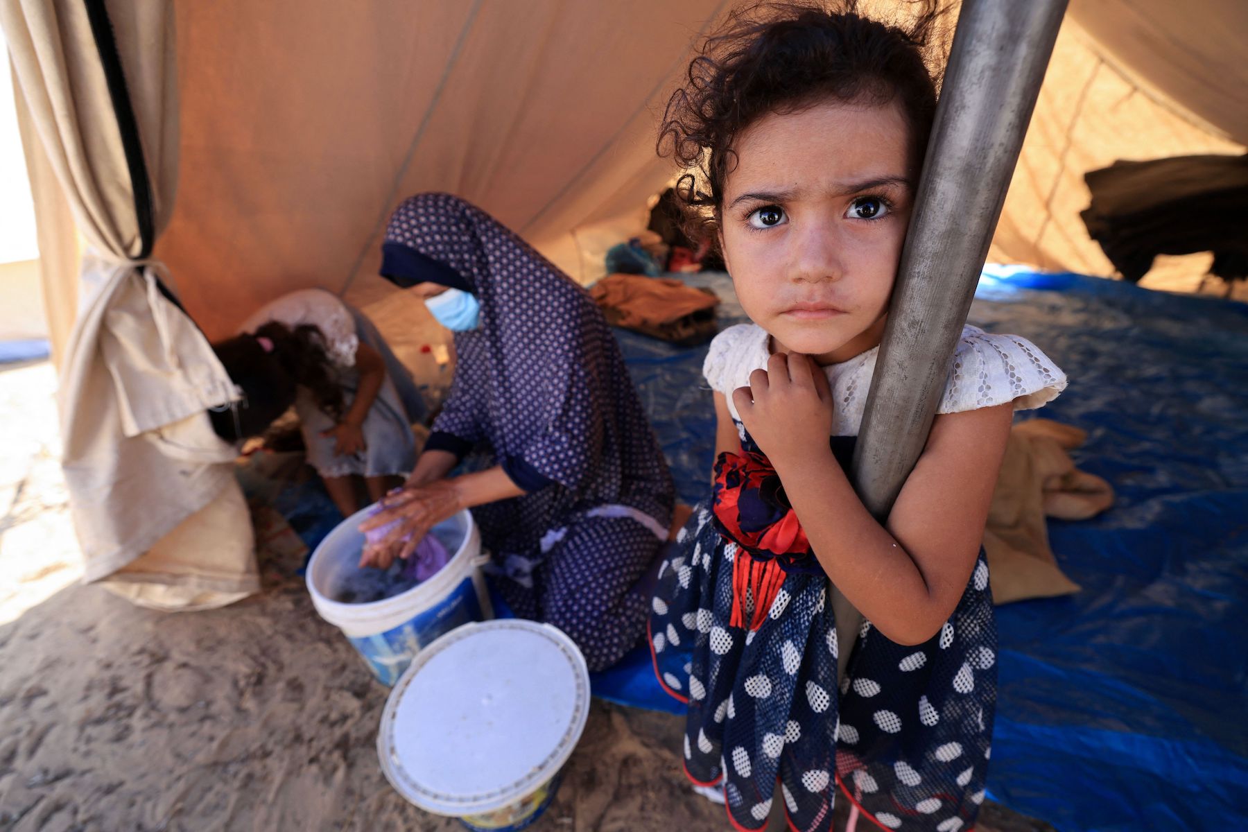 palestine young girl refugee tents gaza
