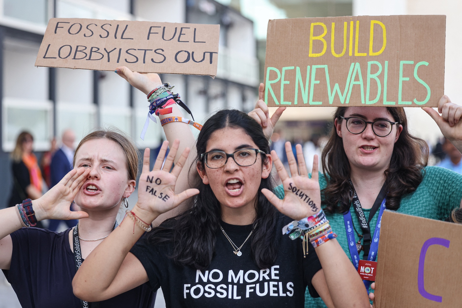 Activists protest against fossil fuels on the sidelines of the COP28