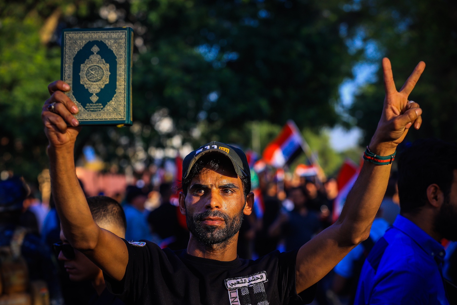 People gather to protest against burning of Quran in Denmark