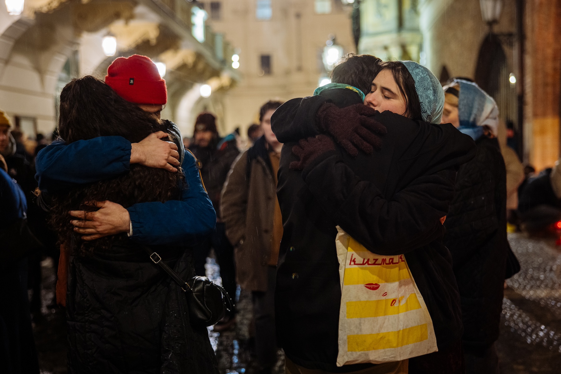 people hugging prague charles university