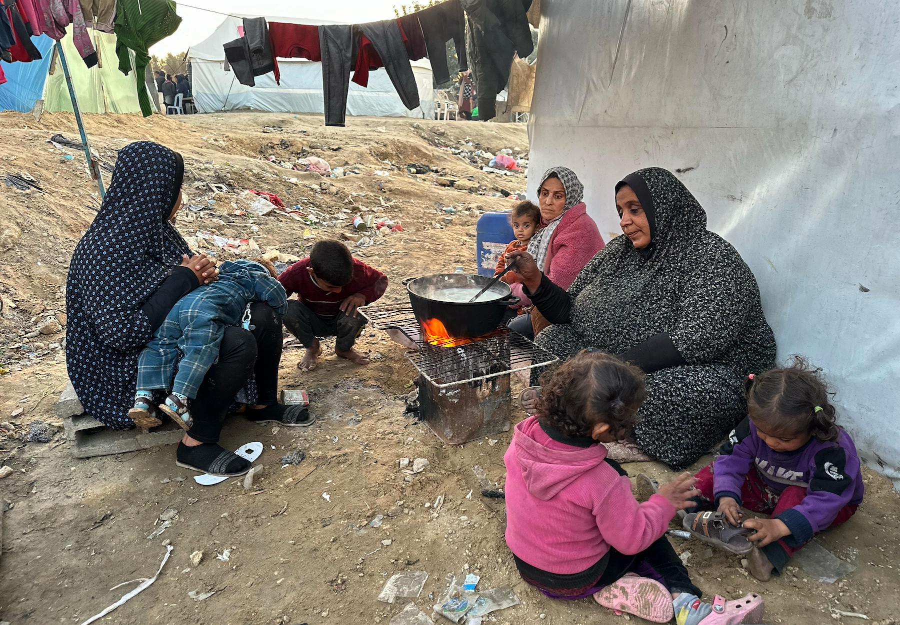 Neda Abdel Salam prepares soup flour water Palestinian family