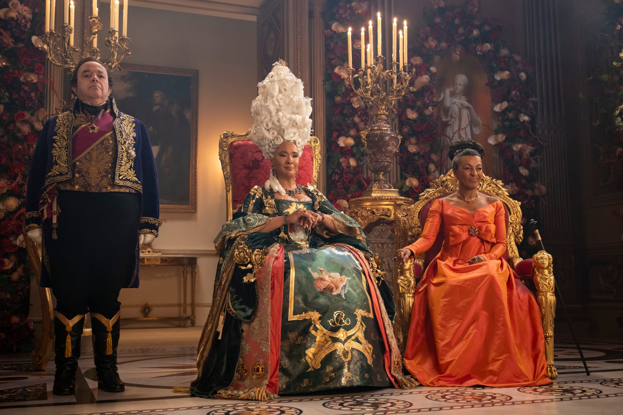 Hugh Sachs as Brimsley, Golda Rosheuvel as Queen Charlotte, Adjoa Andoh as Lady Danbury in 'Bridgerton' Season 4. 