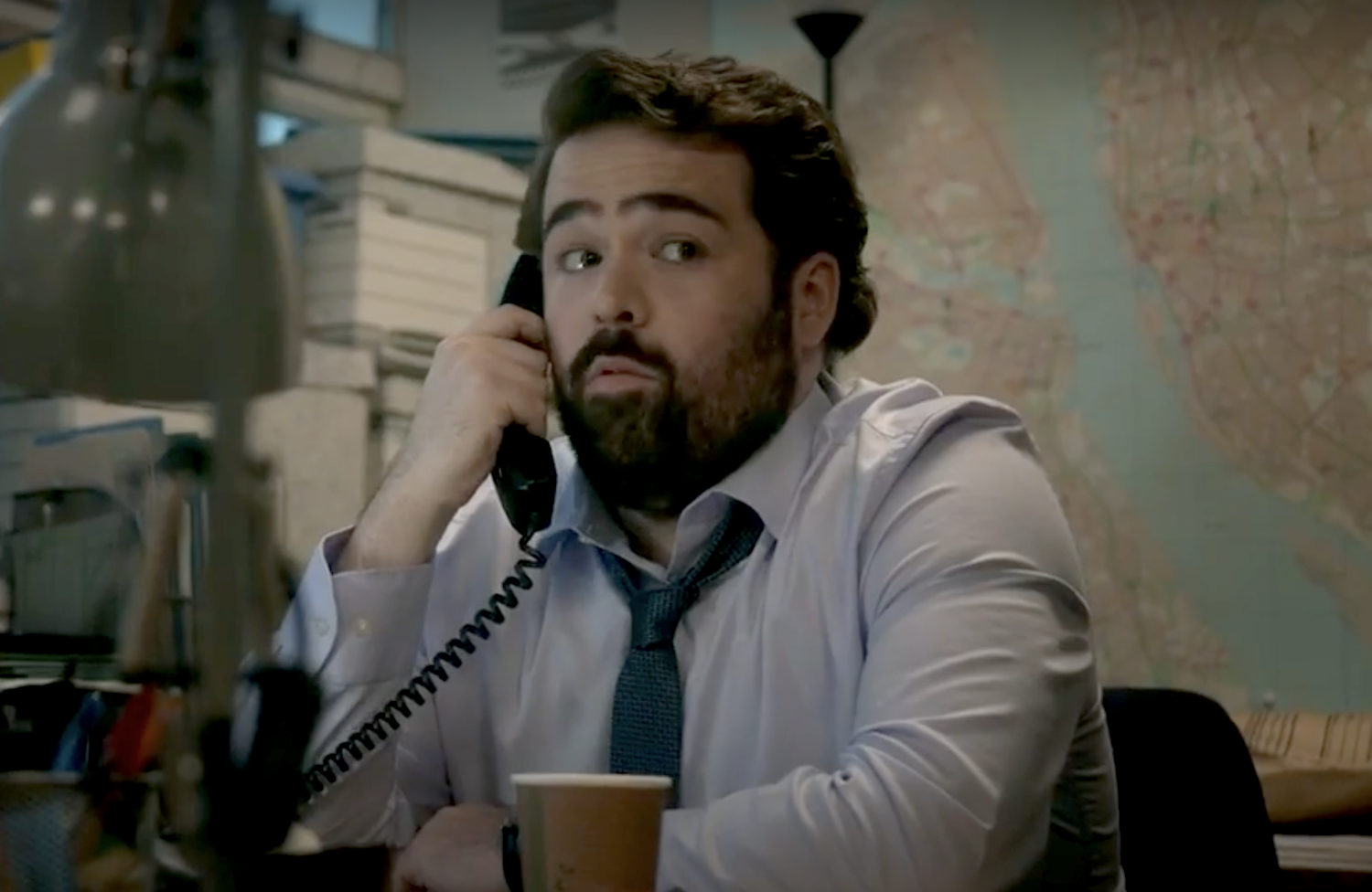 Barney Stiles (Shaun Fagan) works on the case, investigating customs and passports records