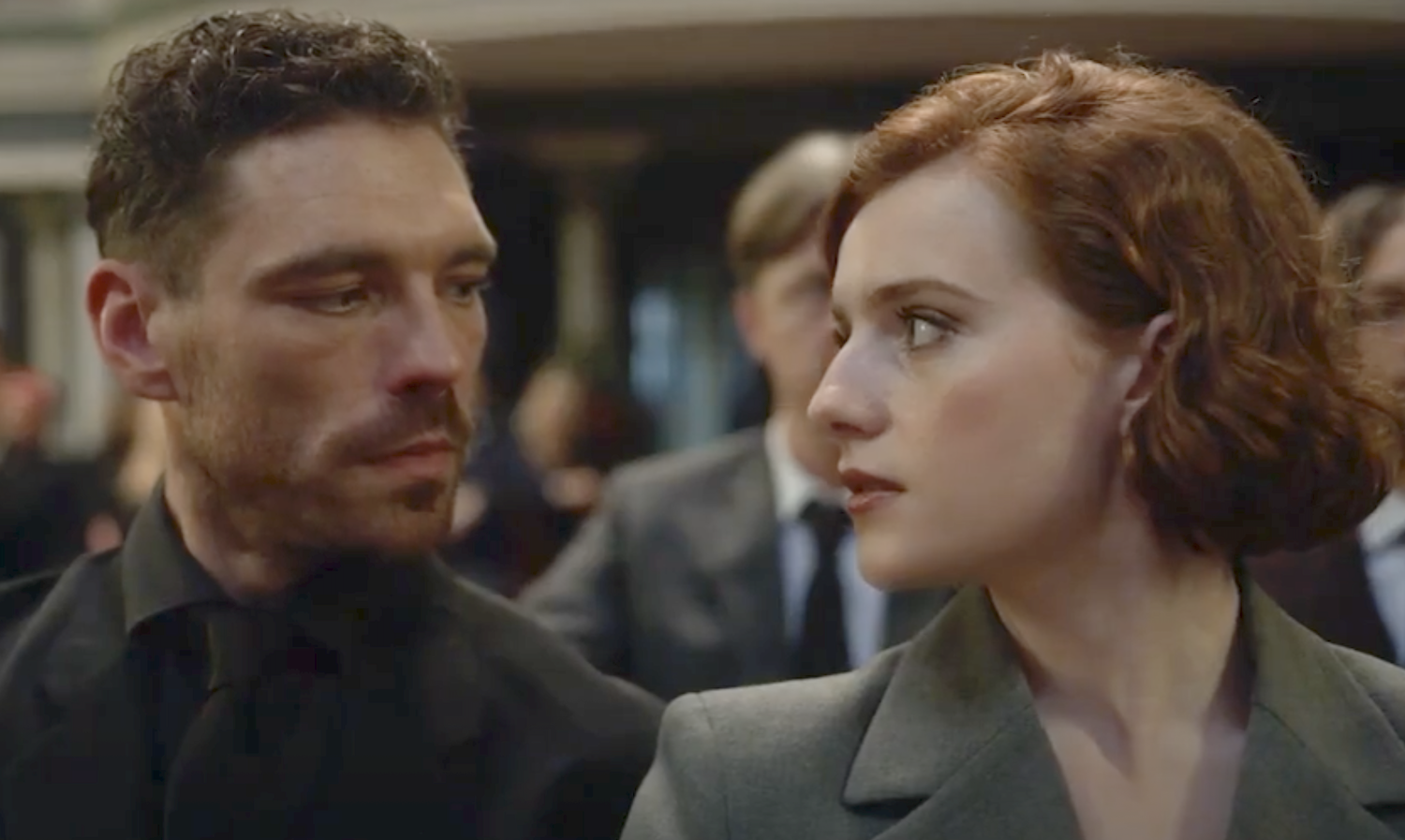Michael (James Nelson-Joyce) and Diana (Hannah Onslow) at the funeral.