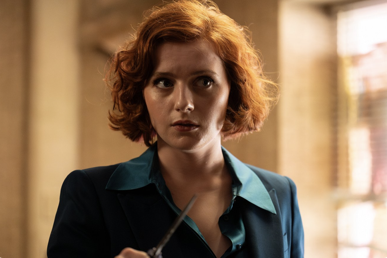 Diana (Hannah Onslow) armed with a knife