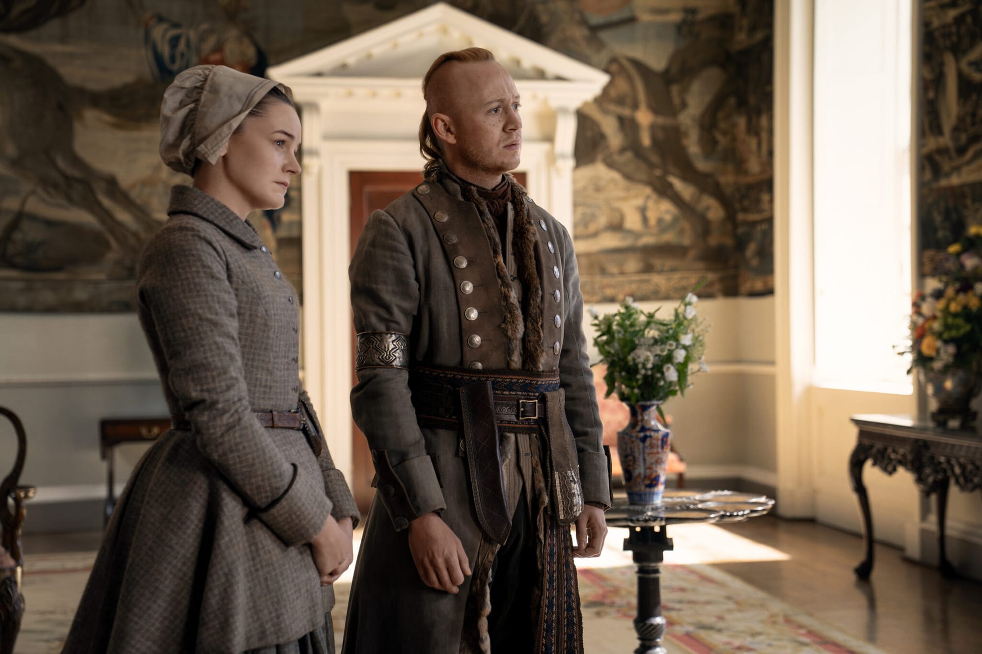 Izzy Meikle-Small and John Bell in 'Outlander' Season 8