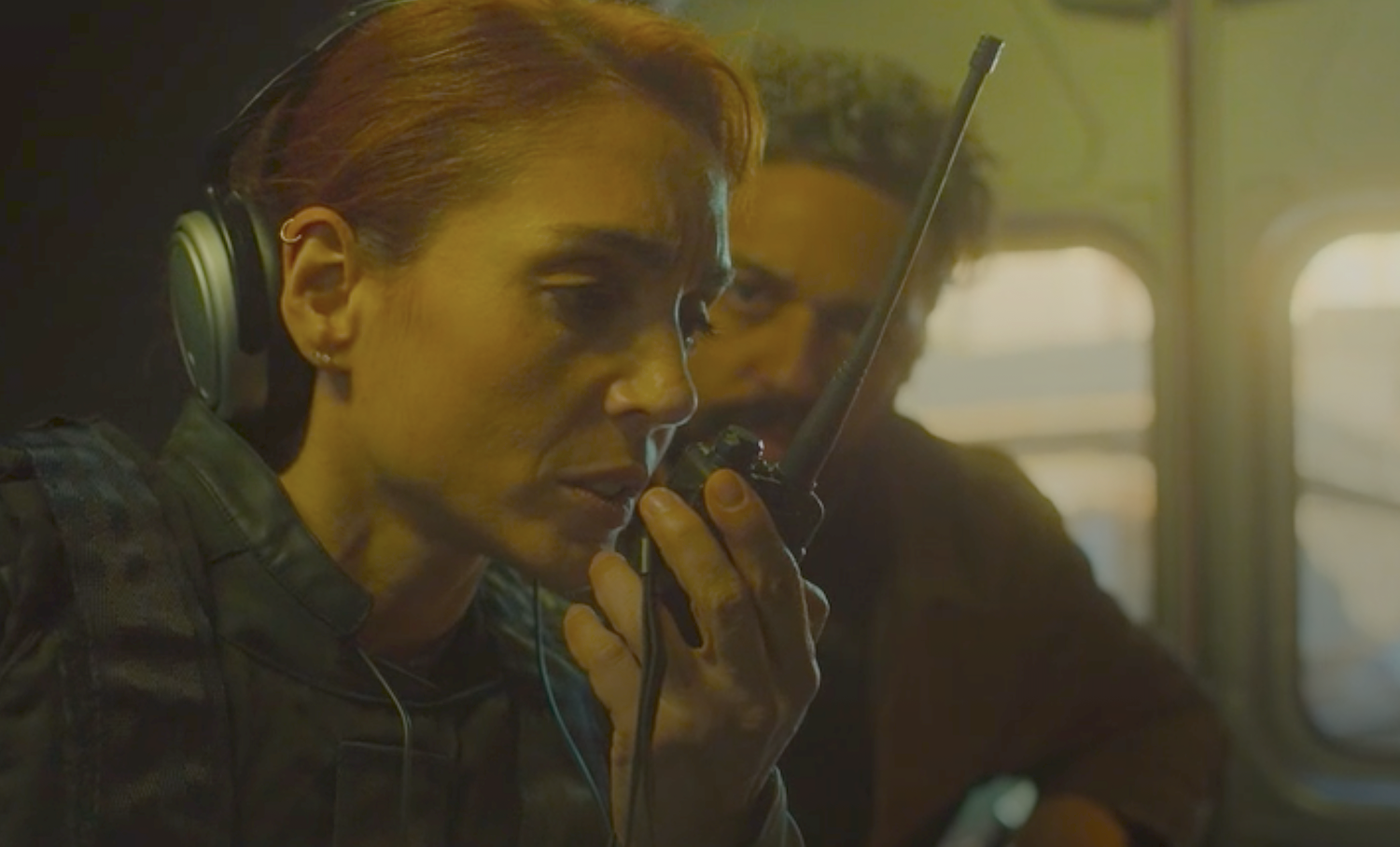 Lara (Cristiana Dell’Anna) and Gianni Gallo (Marouane Zotti) inside the surveillance van
