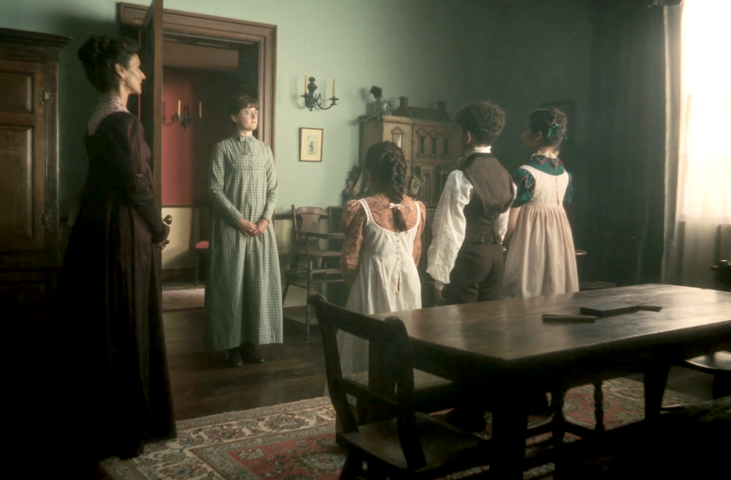 Mrs. Gardiner (Indira Varma) introduces Mary to her pupils Marianne&nbsp;(Roisin Bhalla), George (Reggie Absolom), and Rebecca (Jasmine Sharp)