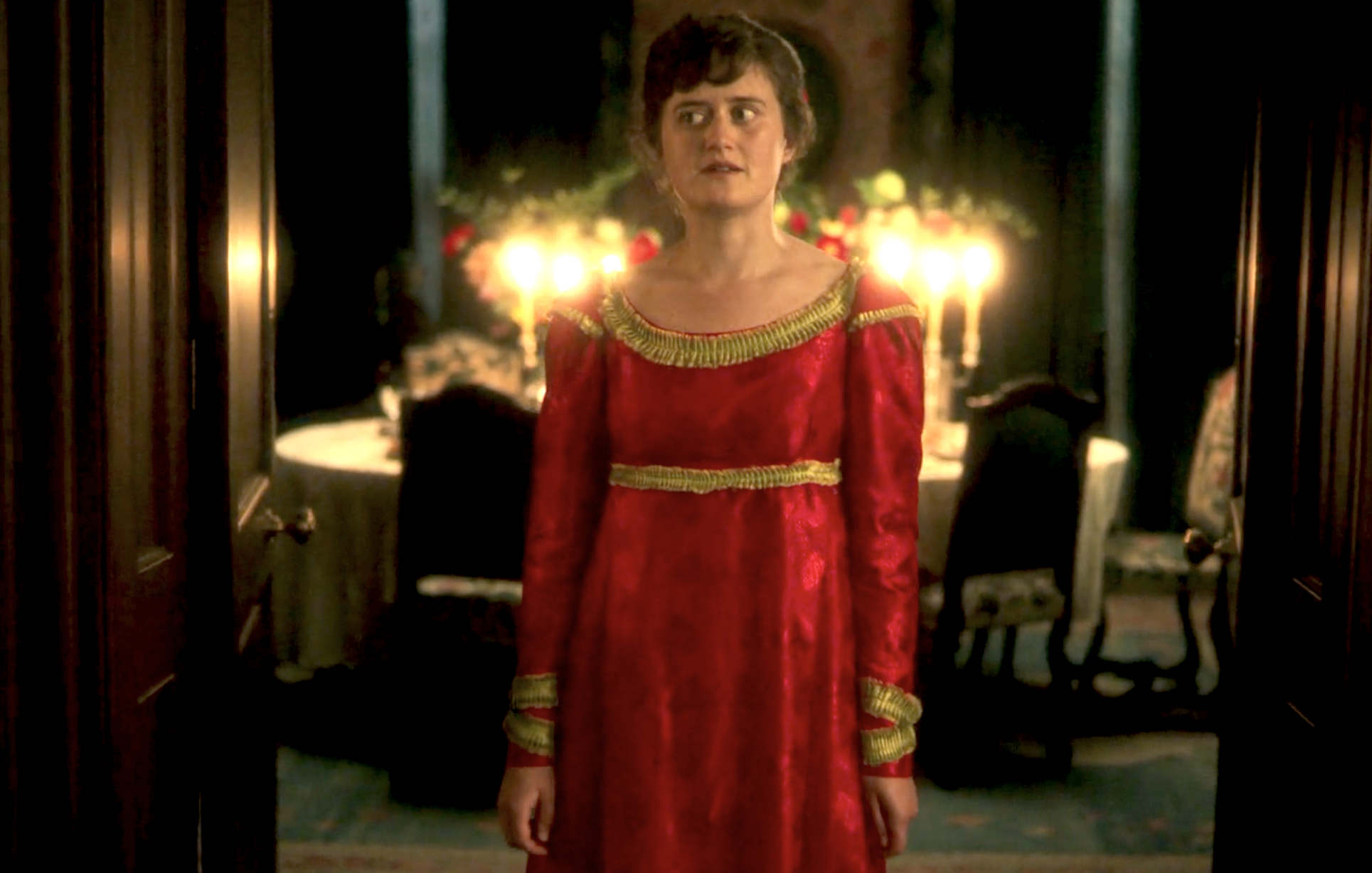 Mary (Ella Bruccoleri) in her new red dress with gold/green trim.