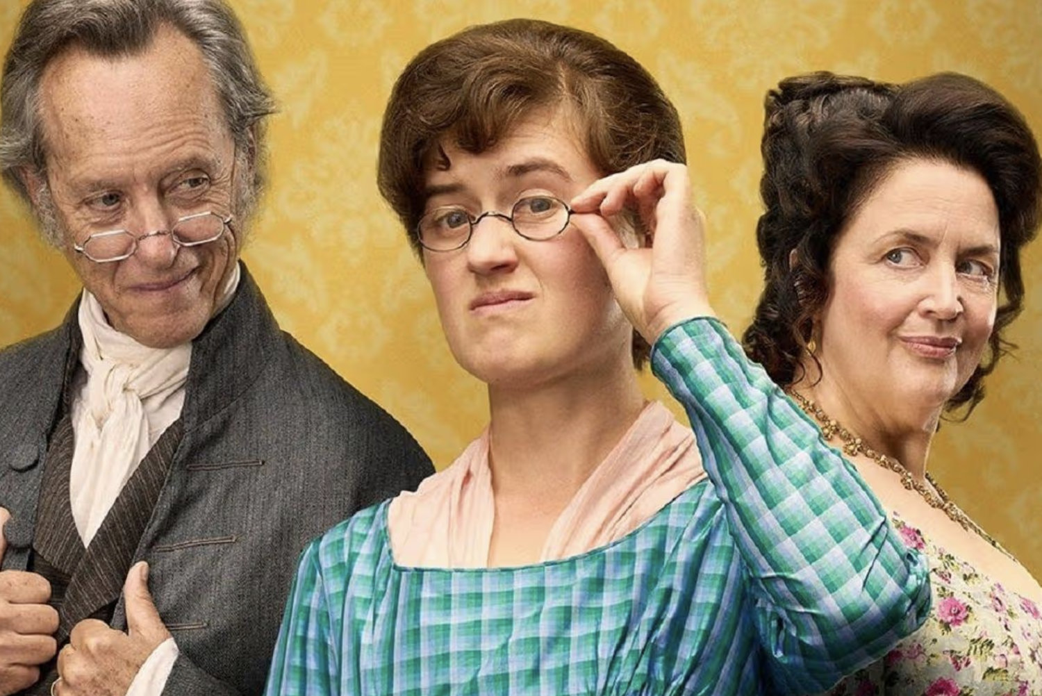 Mary (Ella Bruccoleri) with eyeglasses, Mr. Bennet (Richard E. Grant) and Mrs. Bennet (Ruth Jones)