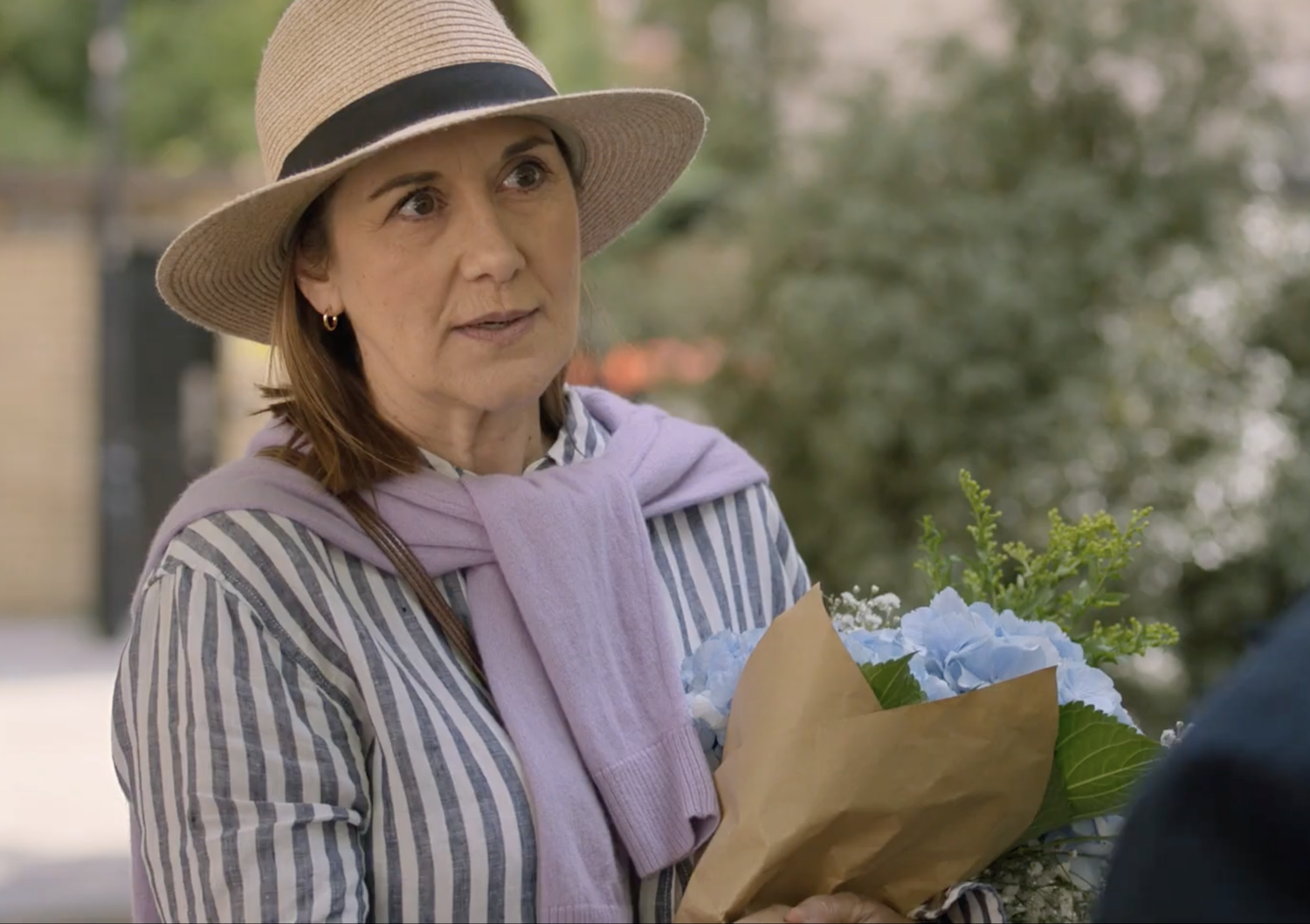 Roz (Alexandra Gilbreath) unexpectedly meets Max at a flower stall