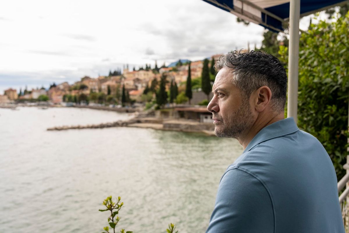 DCI Joe Mottram (Warren Brown) gazes out at the Mediterranean