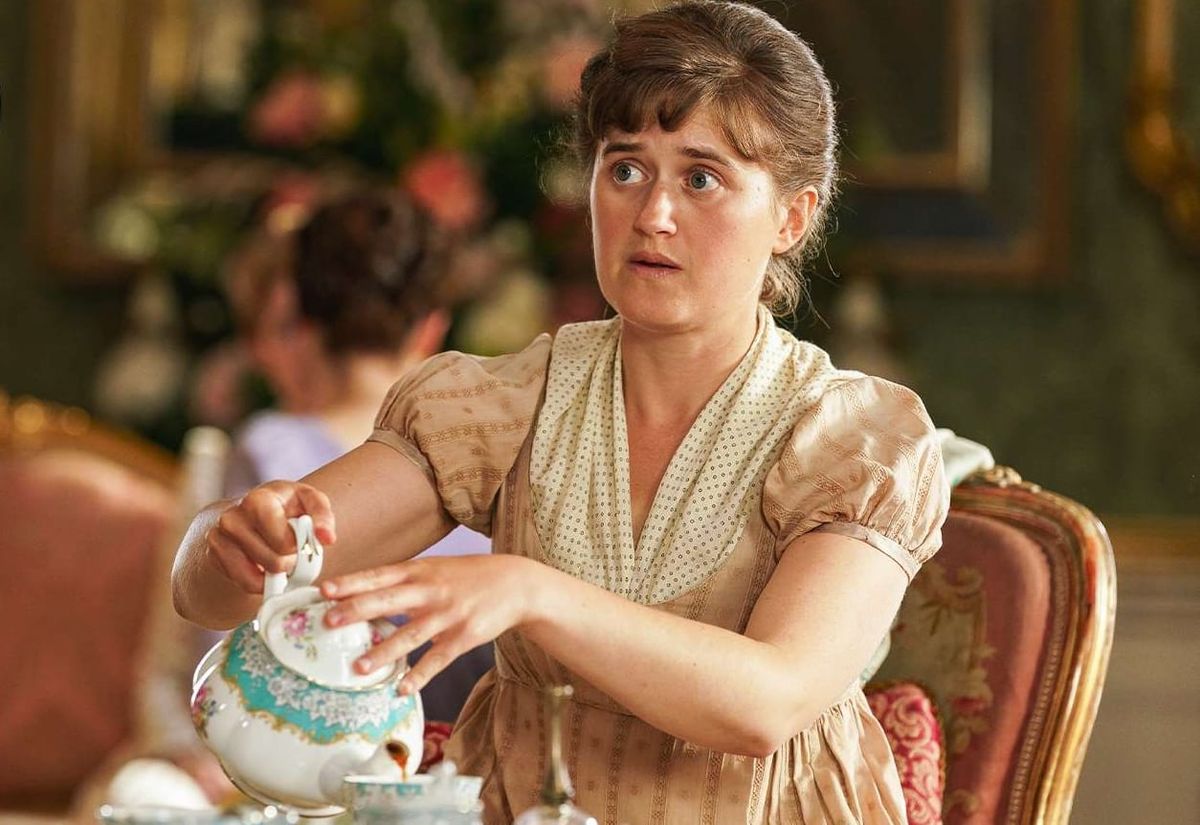 Mary Bennet (Ella Bruccoleri) pours tea.