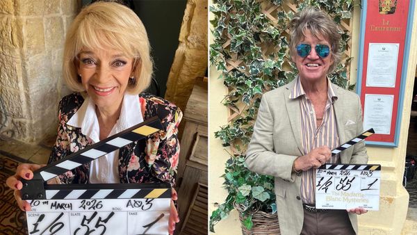 Robin Askwith and Sue Holderness hold clappers from 'The Madame Blanc Mysteries' Season 5 start of production