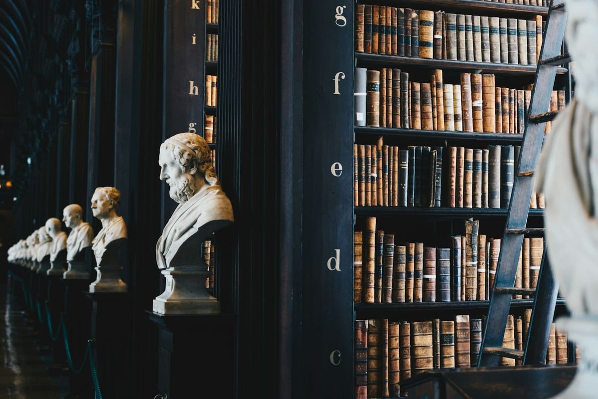 Open law books with a wooden gavel
