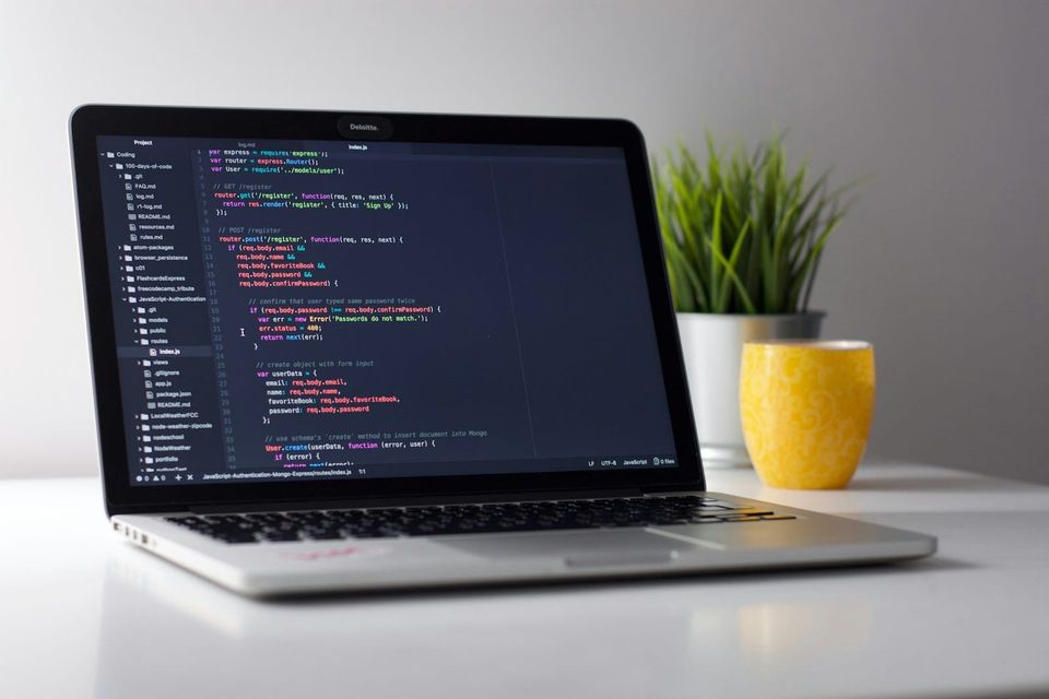 MacBook with code editor