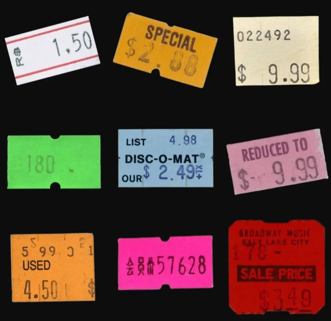 Nine colorful vintage price tags on a black background, including Special, Reduced to and Sale Price