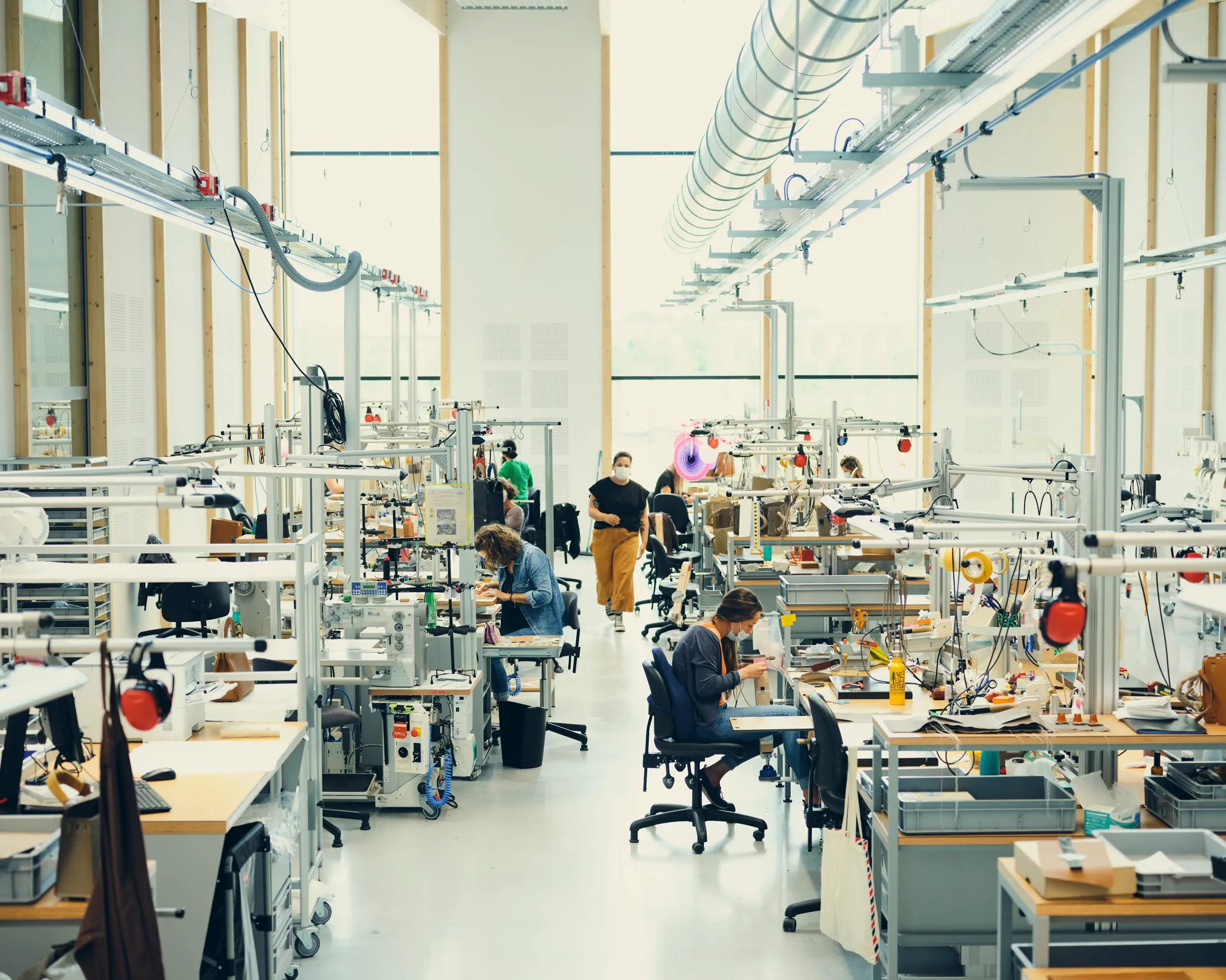 Hermès artisans in the Saint-Vincent-de-Paul workshop, photo by Cyril Zannettacci