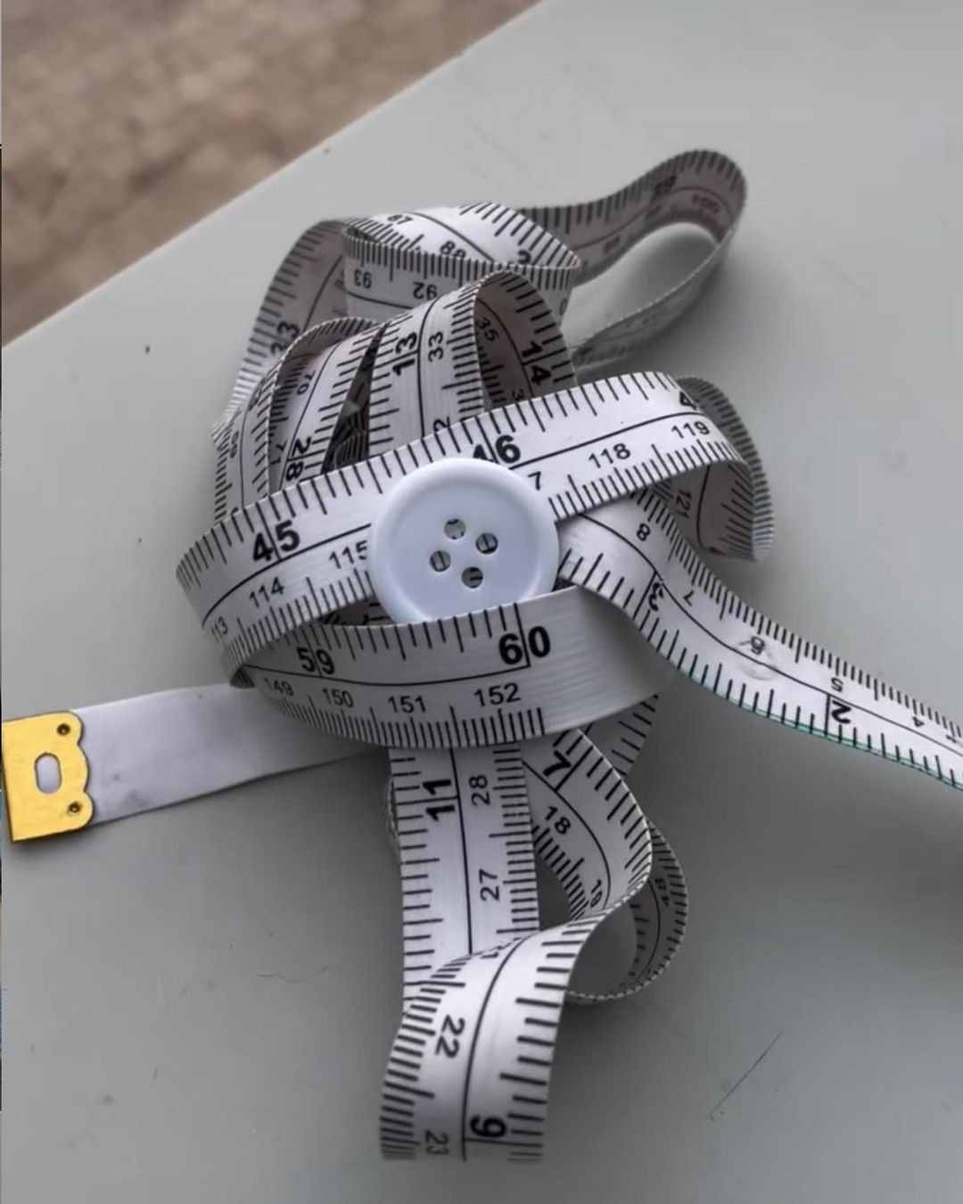 Tape-measure-shaped garment by designer Neil Zhao