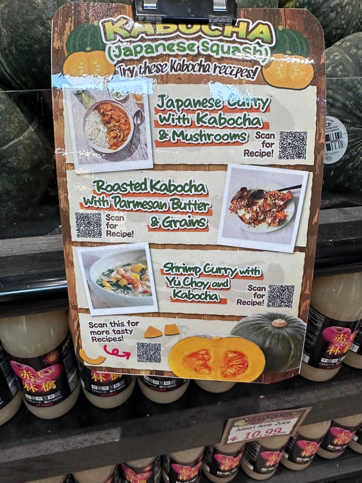 A laminated sign at Tokyo Central Market with recipe QR codes for several ways to make Kabocha.