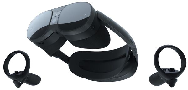 The VR headset and pair of controllers floating on a white background.