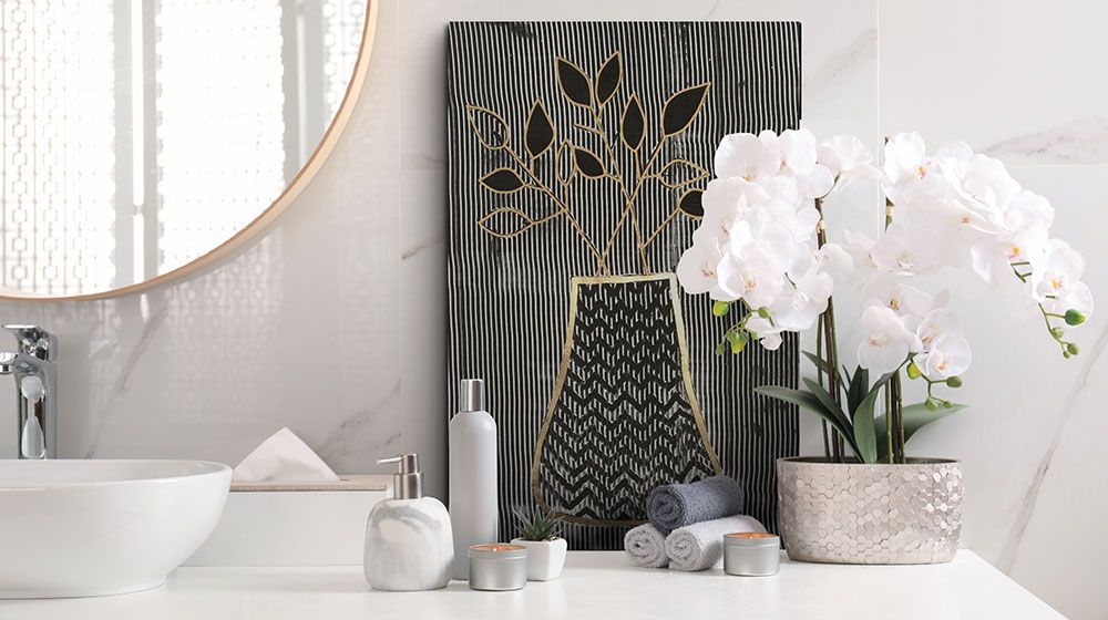 Oscillate Floral I by Vanna Lam Canvas Art on top of a bathroom vanity 