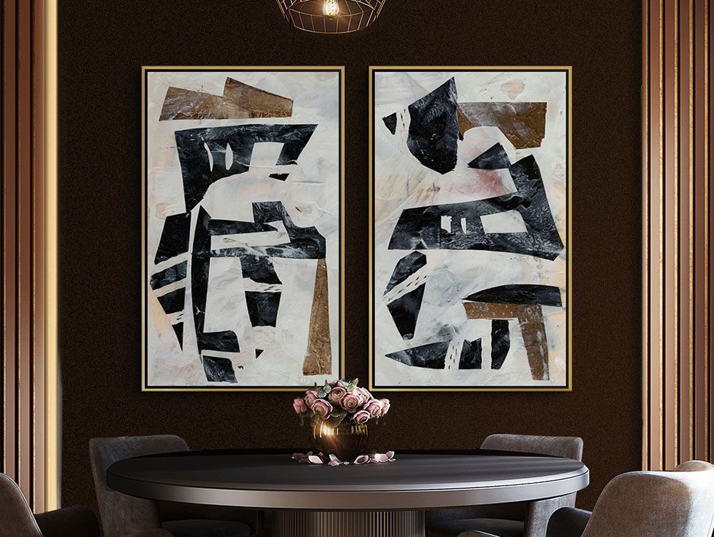 Tribal Collage I and Tribal Collage II Wall Art by Jennifer Goldberger hung side-by-side over a dinning table