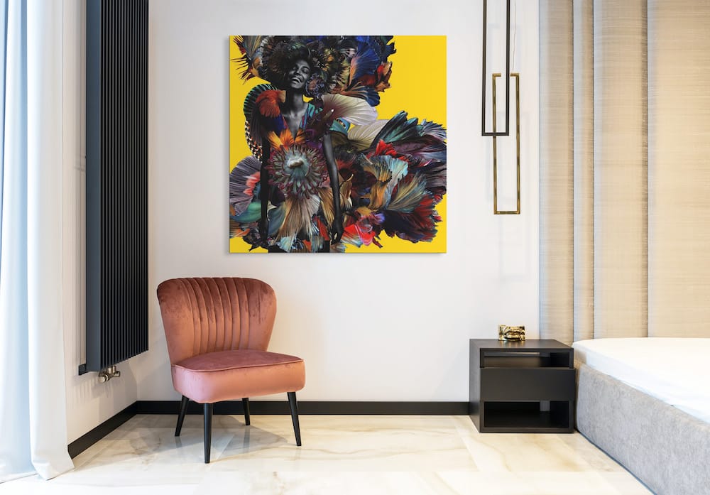 Modern bedroom corner featuring a bold and colorful wall art.