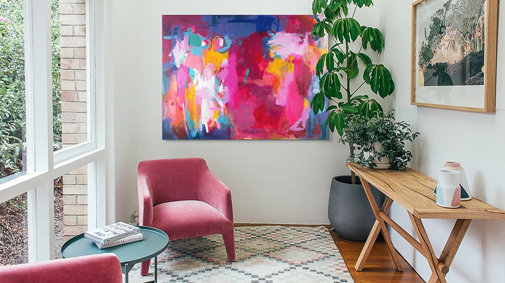 Colorful abstract canvas print in a bright living room