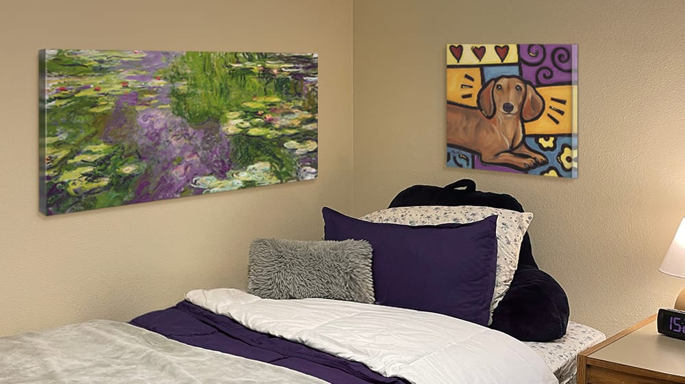 Dorm bed with mixed wall art styles, illustrating how combining prints adds visual interest while maintaining a cohesive look