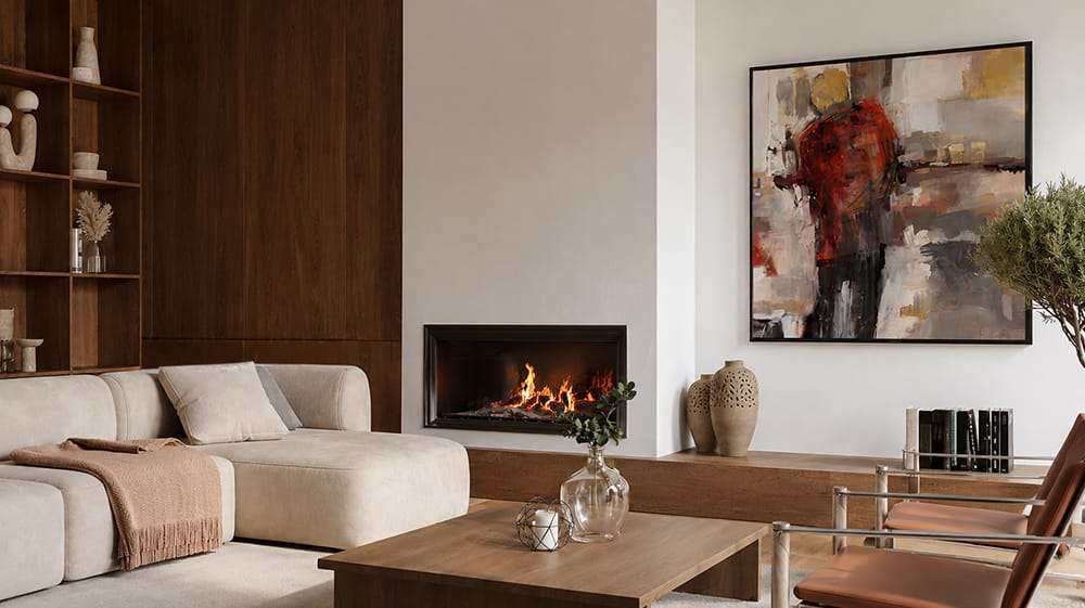 Contemporary living room with abstract wall art near a fireplace showing how oversized art can anchor an open modern space