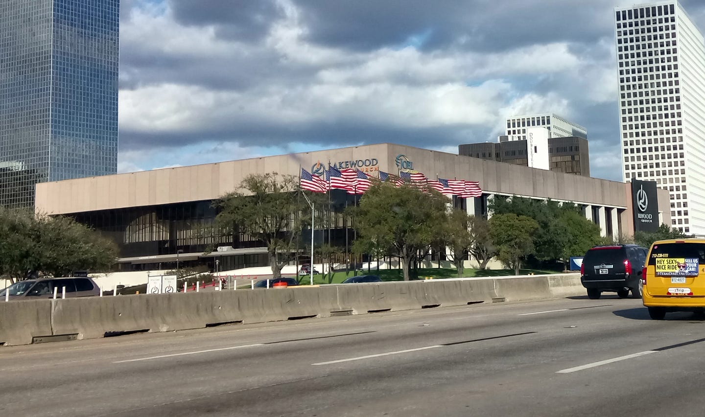 A host of American flags fly outside Joel Osteen’s megachurch in Houston, Texas.
