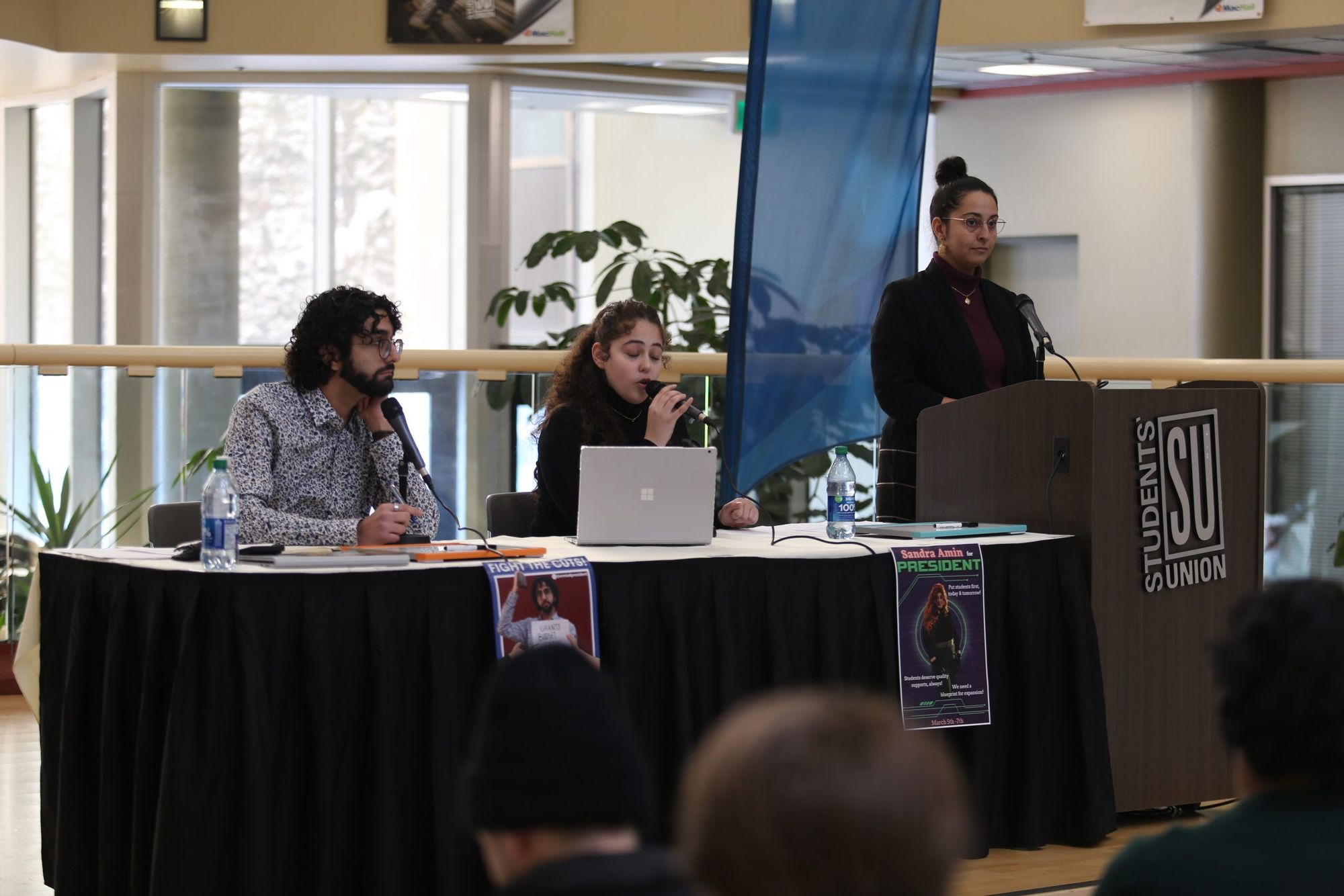 Presidential candidates debate platform points during SU forum